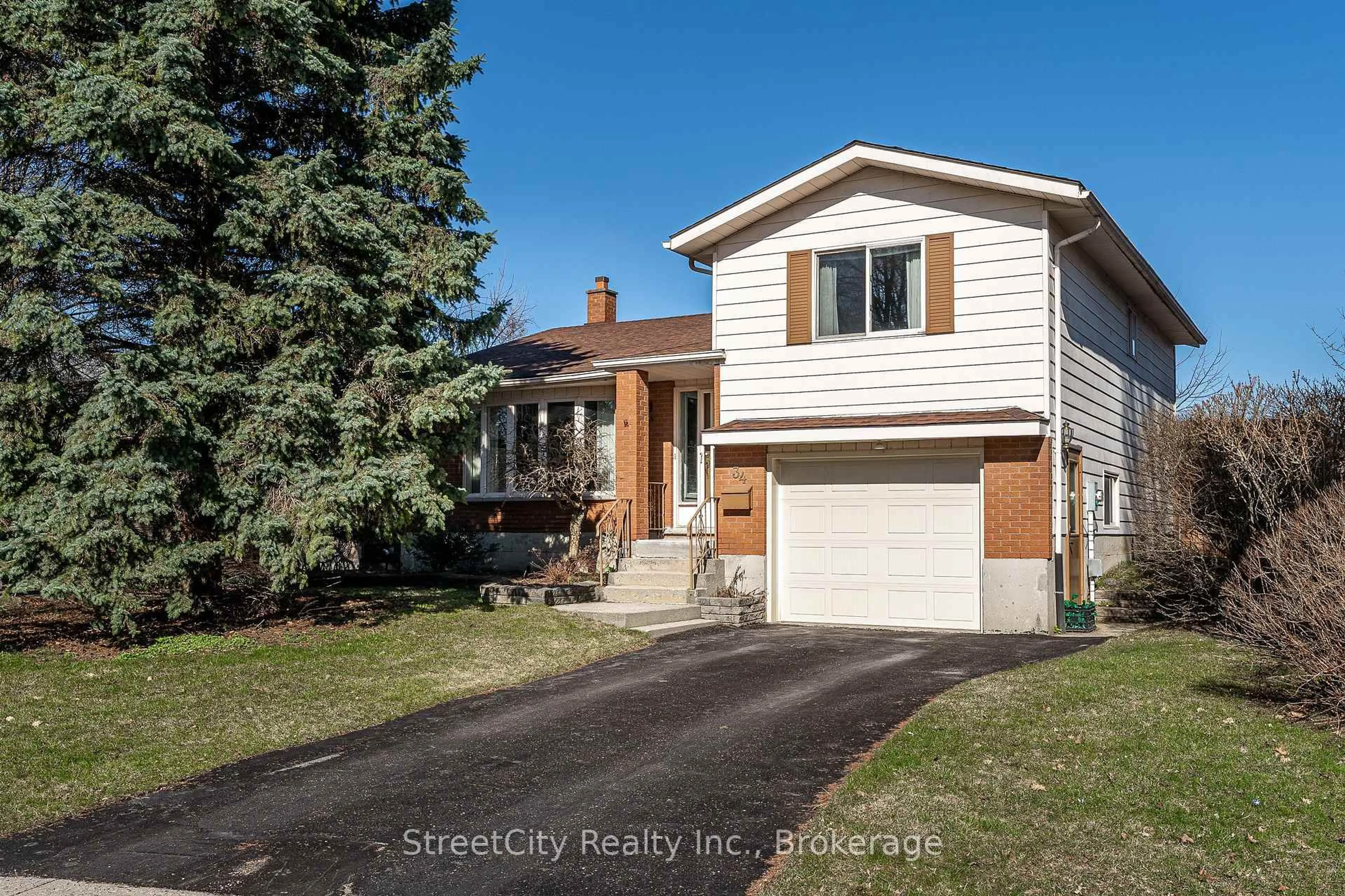 Home with vinyl exterior material, street for 34 White St, Stratford Ontario N5A 7M5