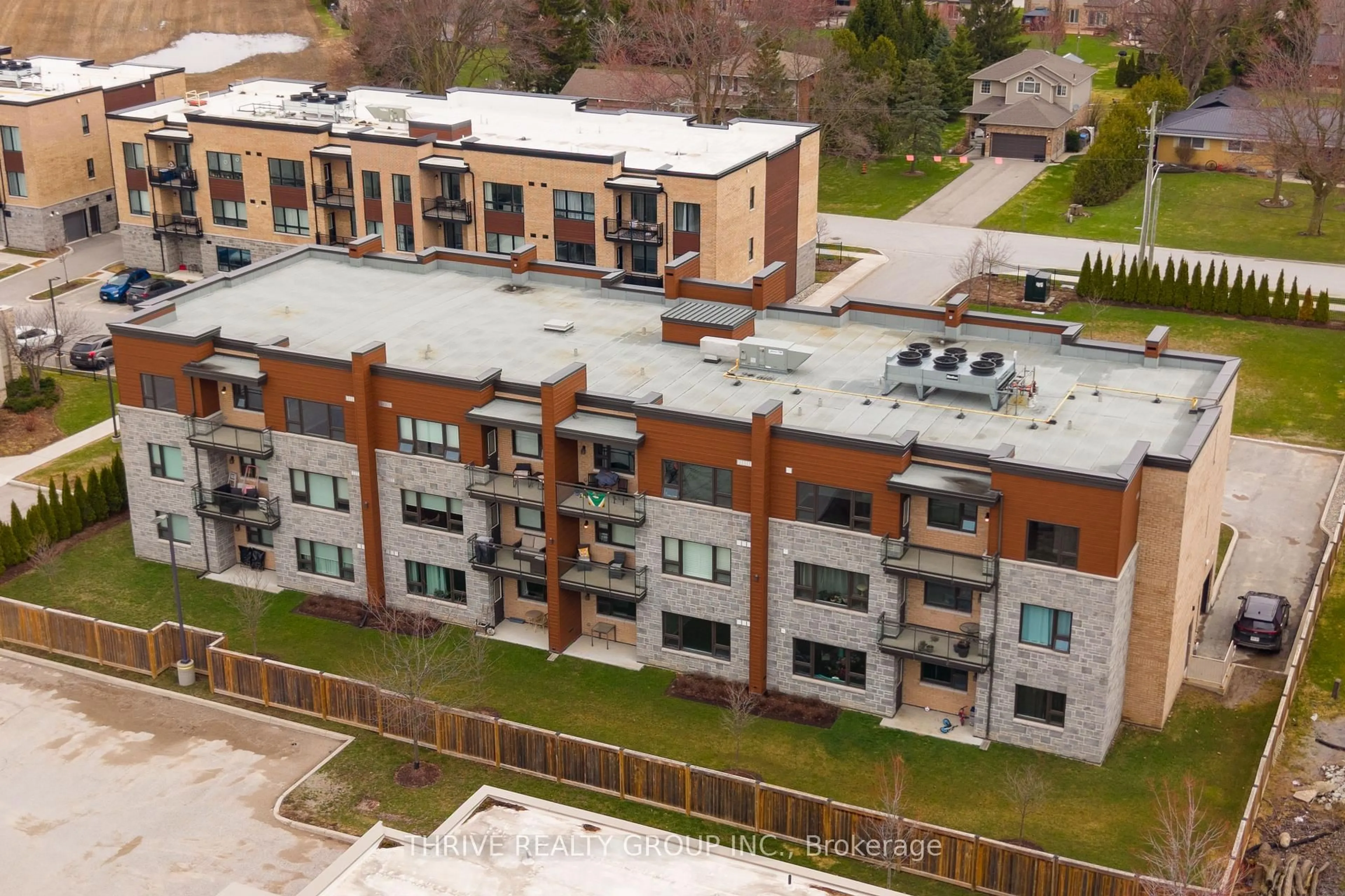 A pic from outside/outdoor area/front of a property/back of a property/a pic from drone, building for 263 Butler St #303, Lucan Biddulph Ontario N0M 2J0