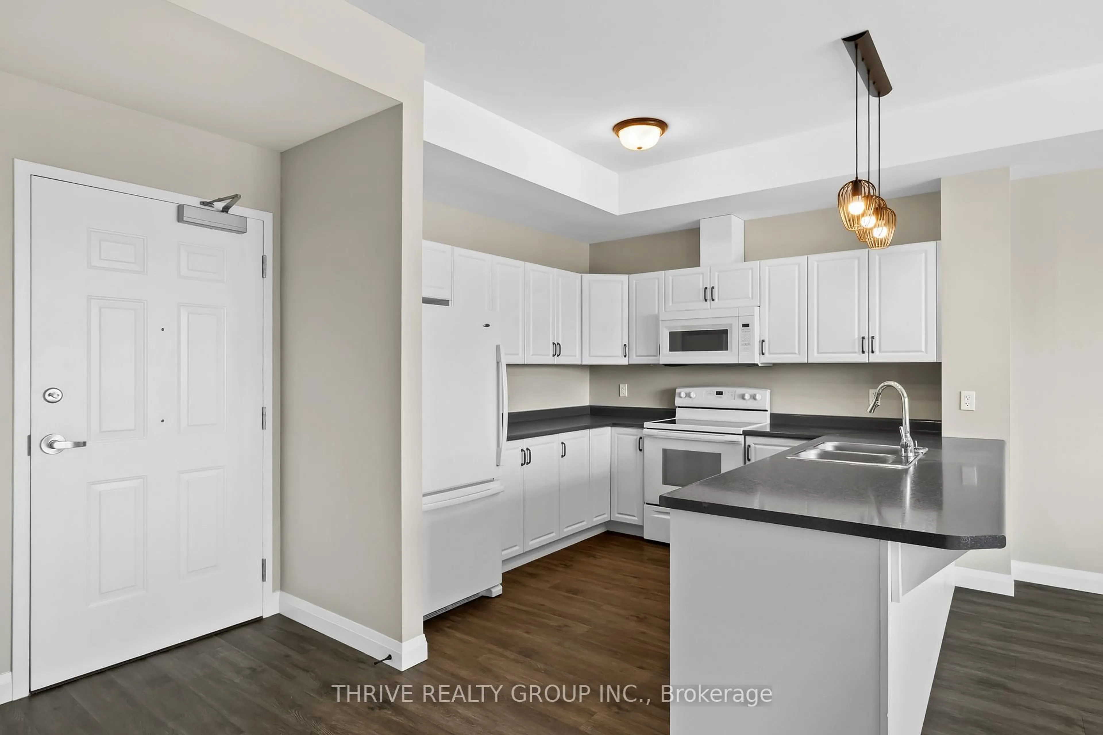 Open concept kitchen, unknown for 263 Butler St #303, Lucan Biddulph Ontario N0M 2J0