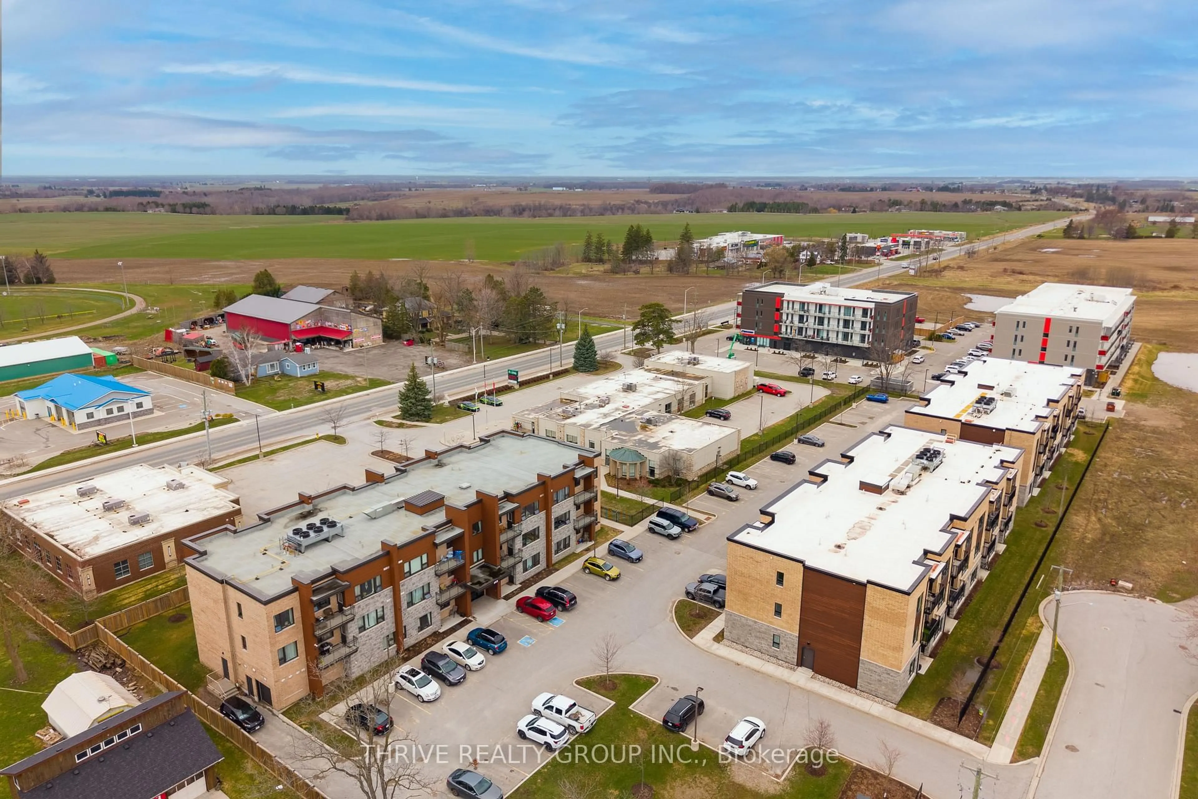A pic from outside/outdoor area/front of a property/back of a property/a pic from drone, unknown for 263 Butler St #306, Lucan Biddulph Ontario N0M 2J0