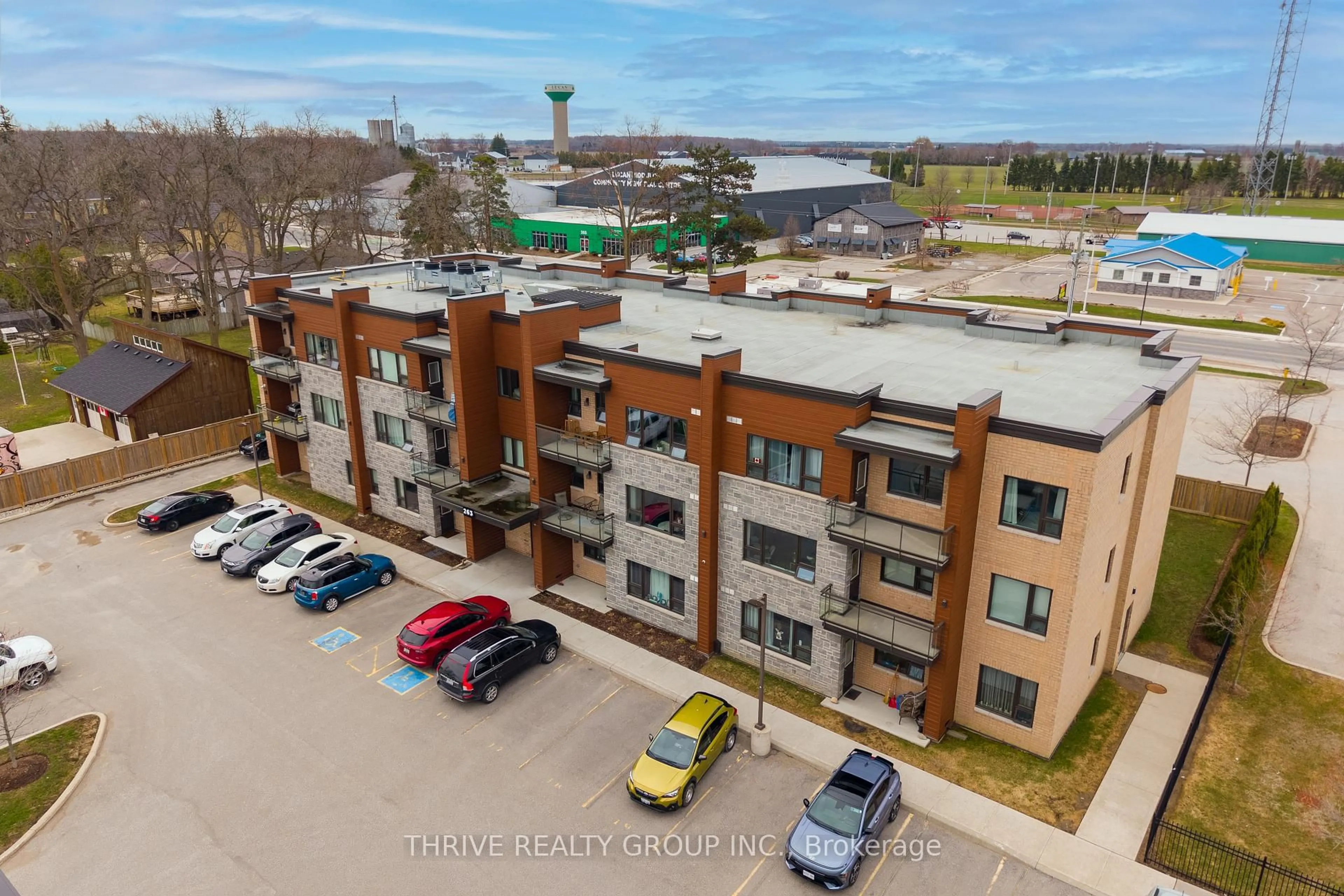 A pic from outside/outdoor area/front of a property/back of a property/a pic from drone, building for 263 Butler St #306, Lucan Biddulph Ontario N0M 2J0