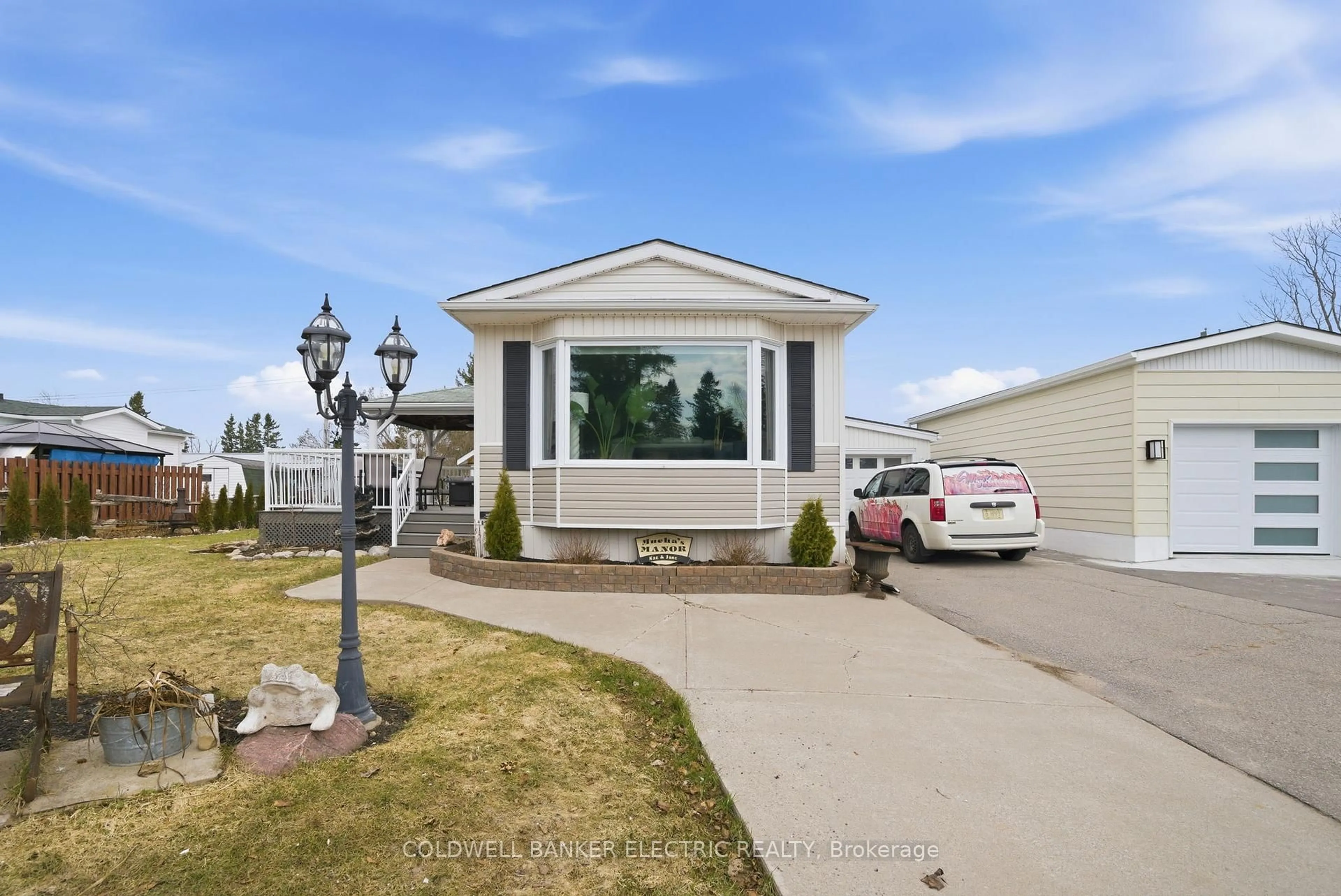 Home with vinyl exterior material, street for 7 Homewood Ave, Kawartha Lakes Ontario K9V 0H5