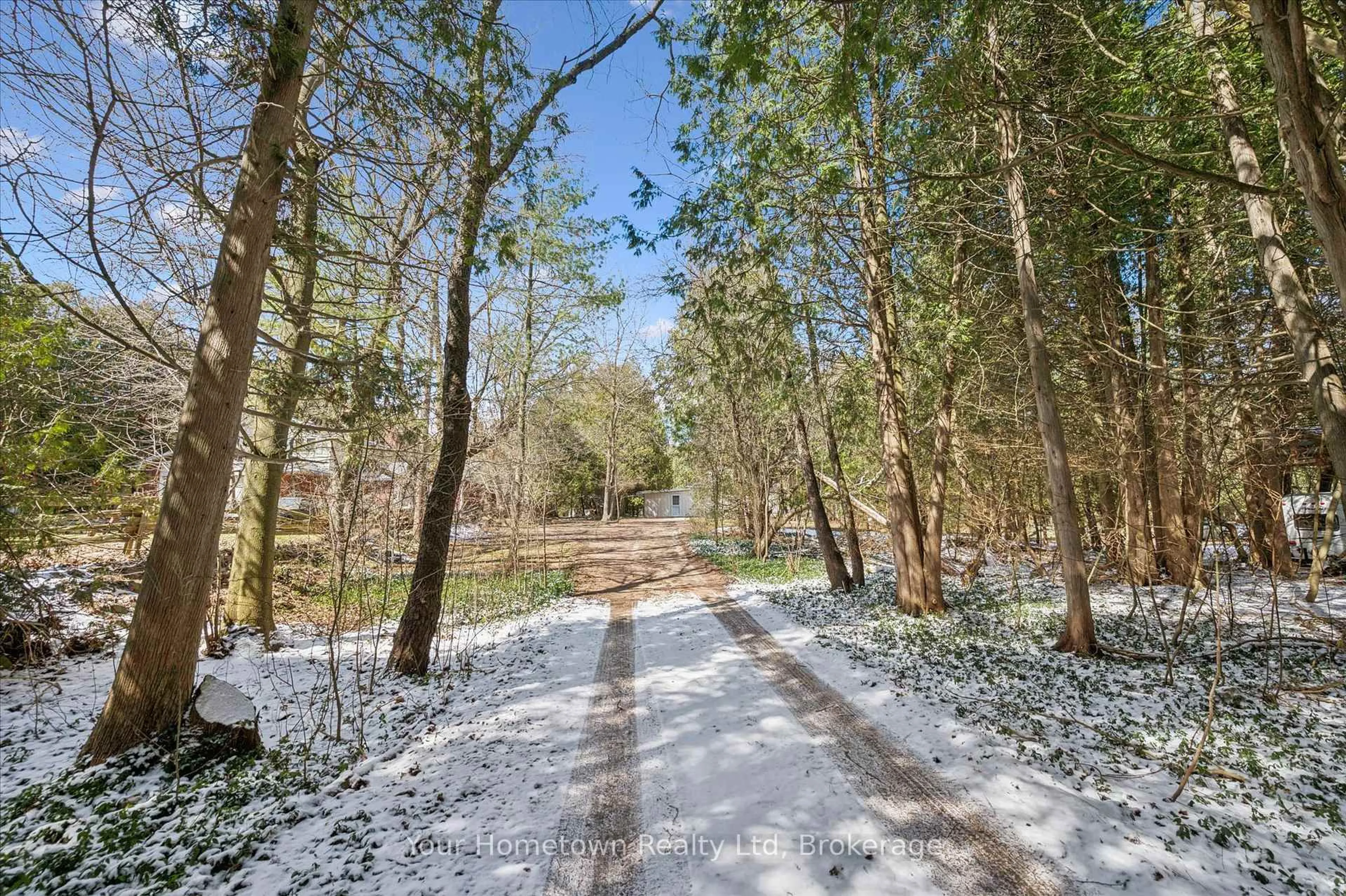 A pic from outside/outdoor area/front of a property/back of a property/a pic from drone, forest/trees view for 565 Old Orangeville Rd, Centre Wellington Ontario N1M 1T9