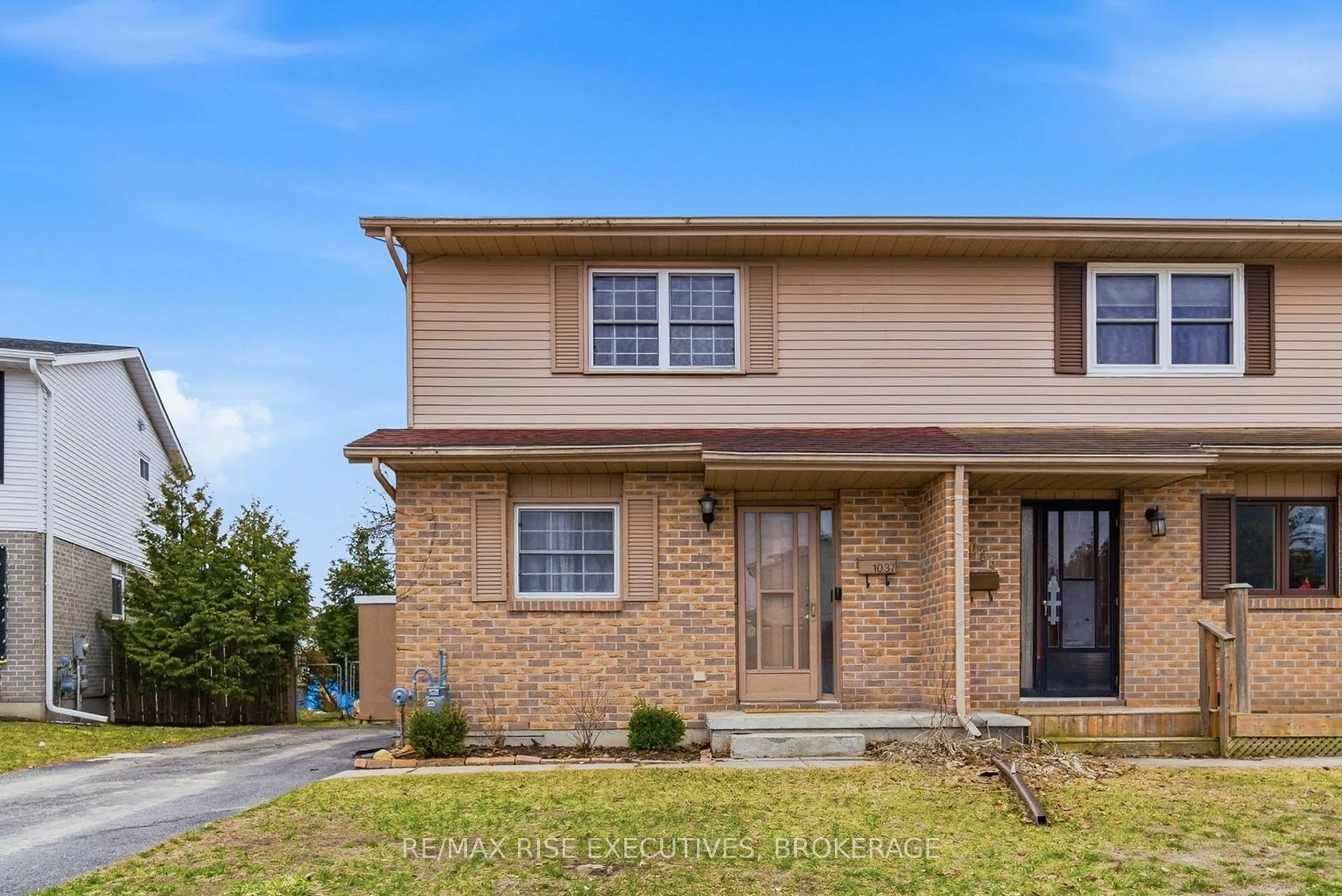 Home with brick exterior material, street for 1037 Hickorywood Cres, Kingston Ontario K7P 2E5