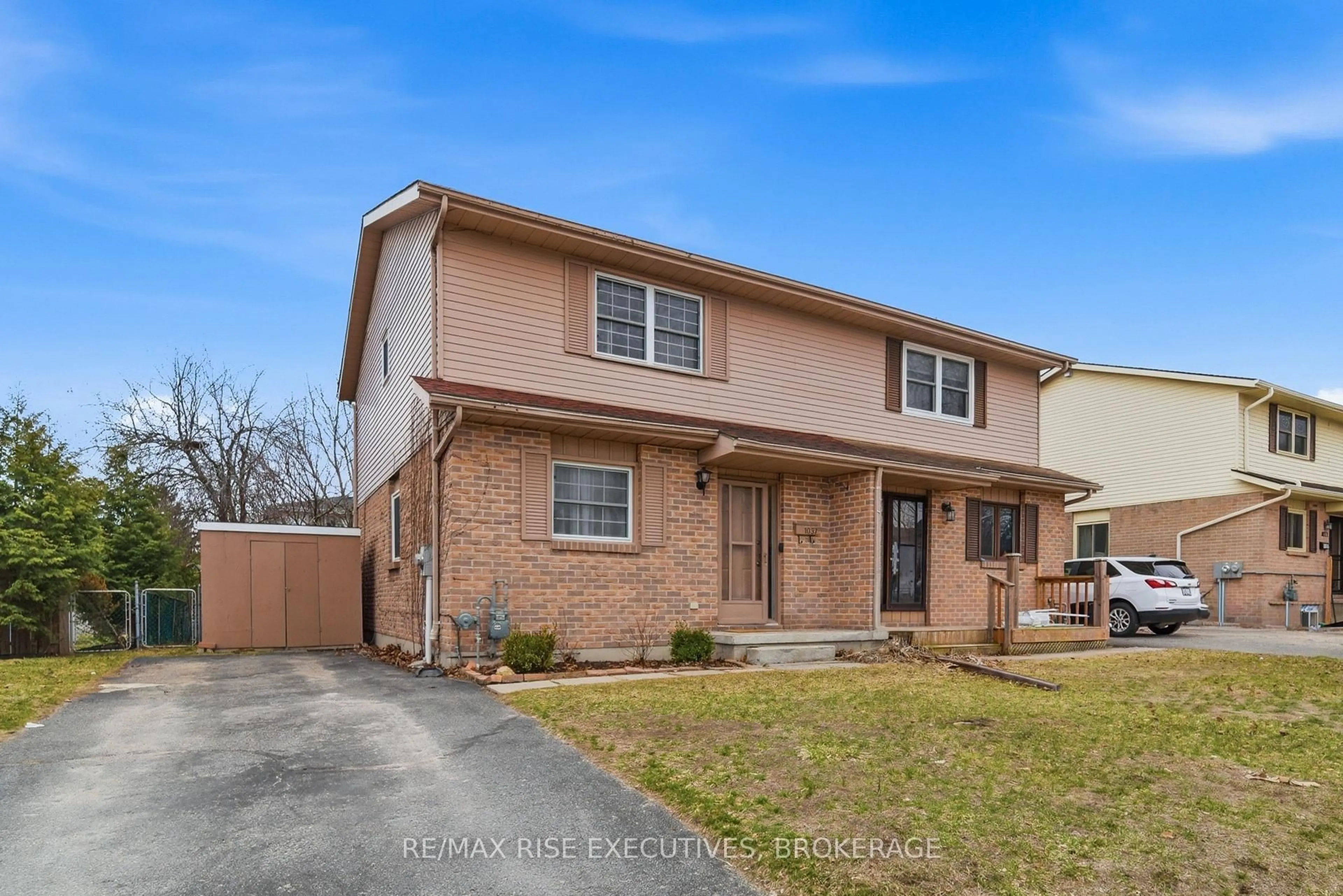 Home with brick exterior material, street for 1037 Hickorywood Cres, Kingston Ontario K7P 2E5