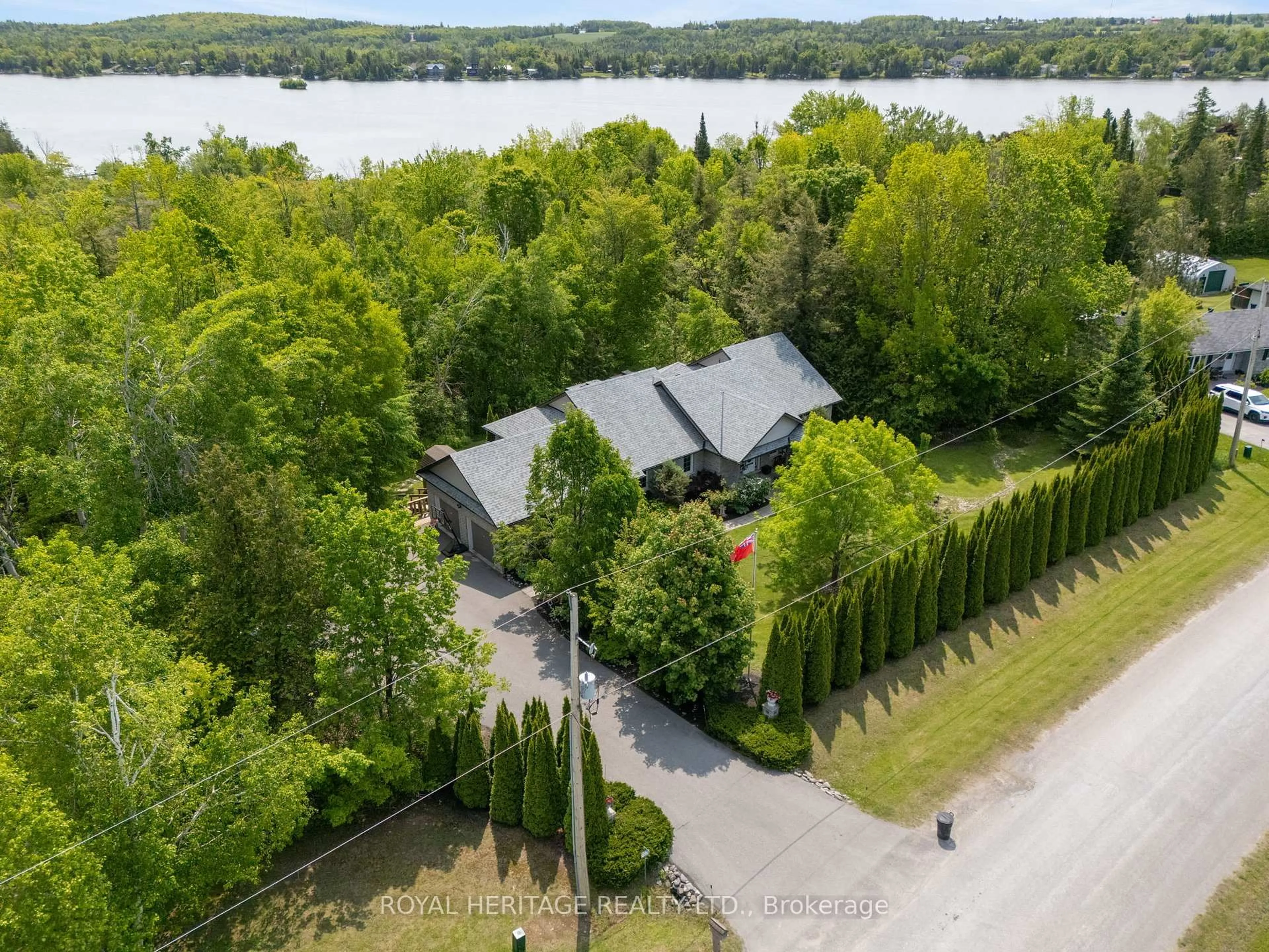 A pic from outside/outdoor area/front of a property/back of a property/a pic from drone, water/lake/river/ocean view for 141 Shanagarry Dr, Selwyn Ontario K0L 1T0