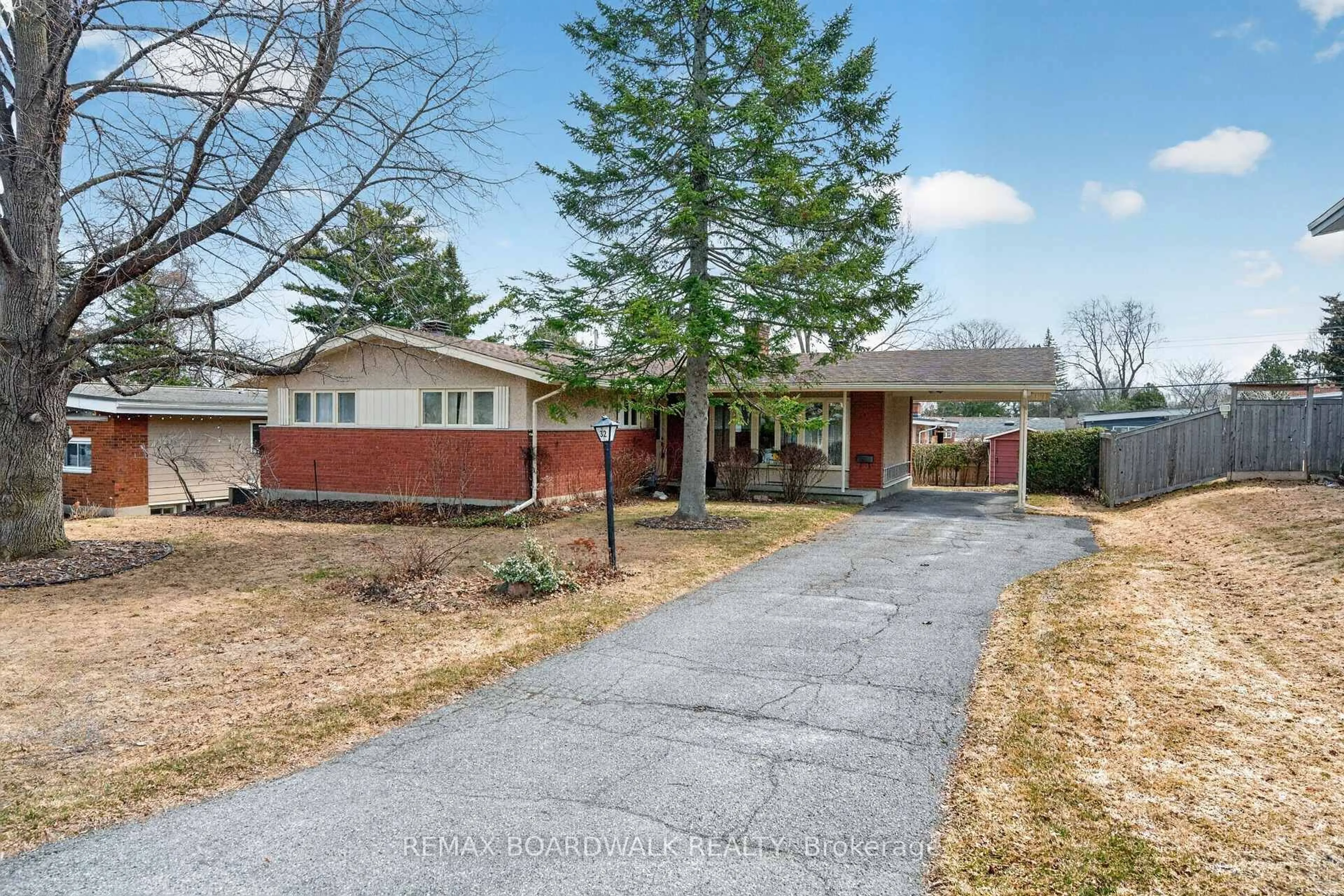 Home with brick exterior material, street for 32 Bowmoor Ave, Ottawa Ontario K2E 6M4