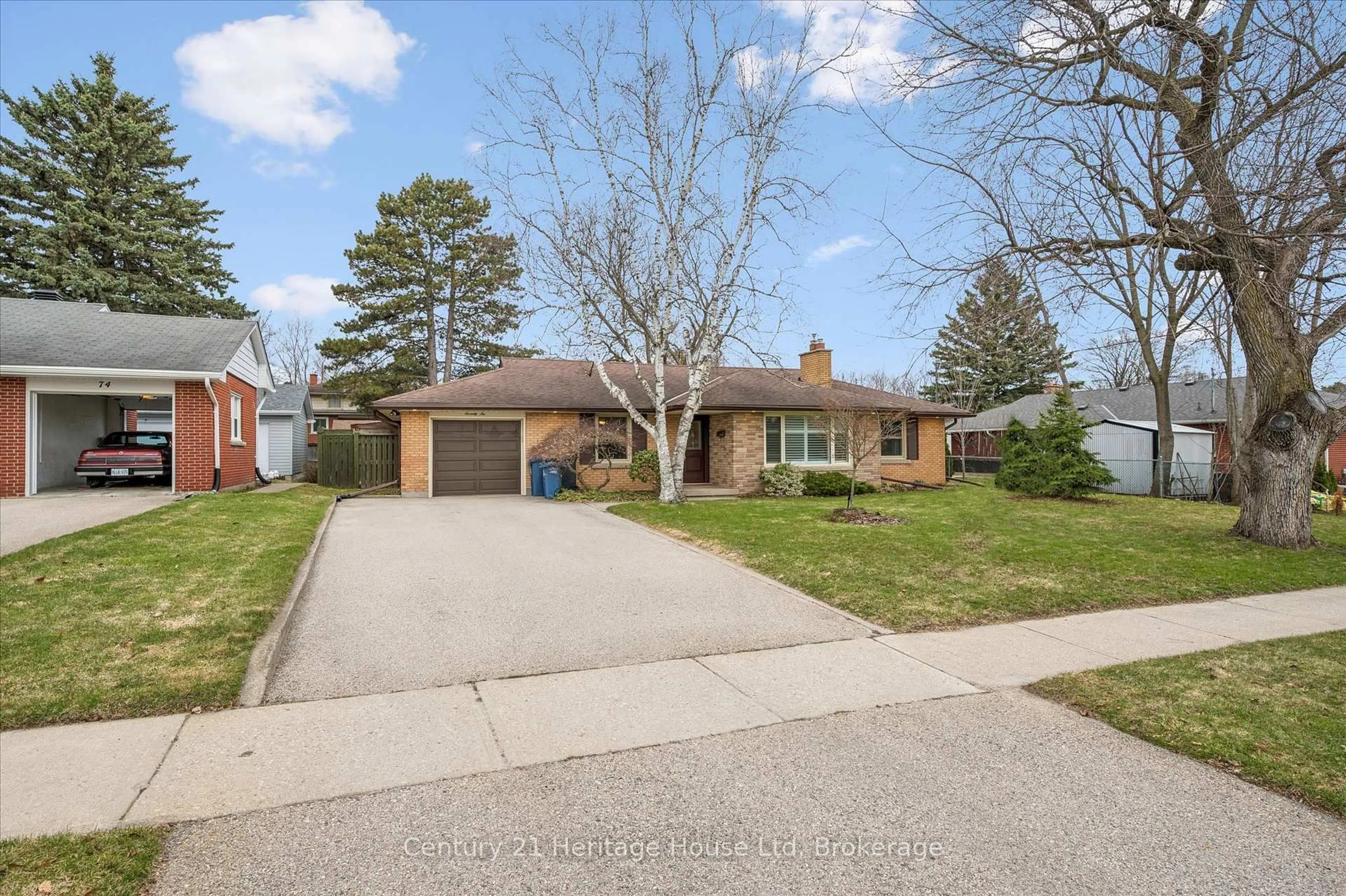 Home with brick exterior material, street for 76 Kensington St, Guelph Ontario N1E 3P7