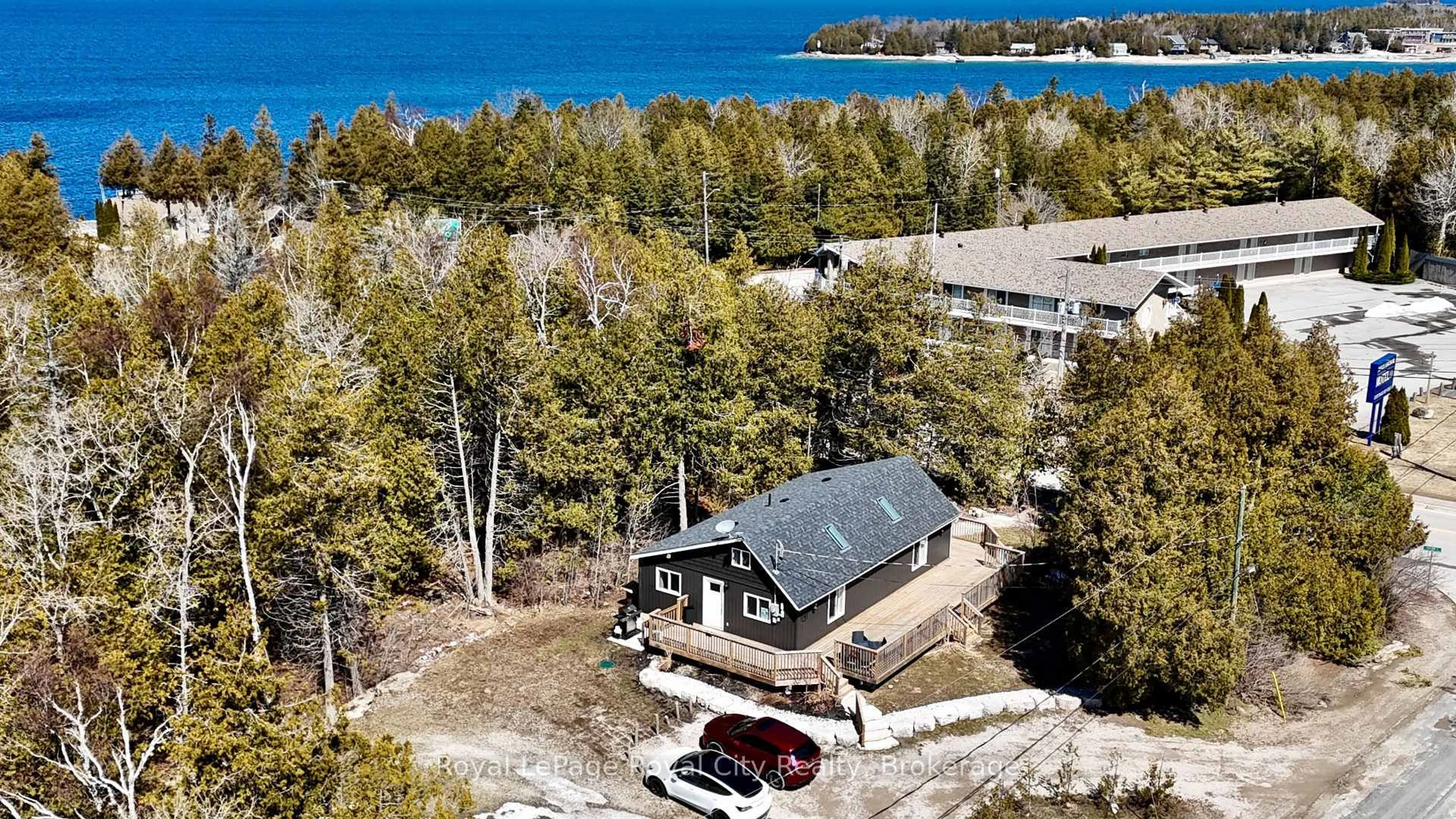 A pic from outside/outdoor area/front of a property/back of a property/a pic from drone, water/lake/river/ocean view for 4 Legion St, Northern Bruce Peninsula Ontario N0H 2R0