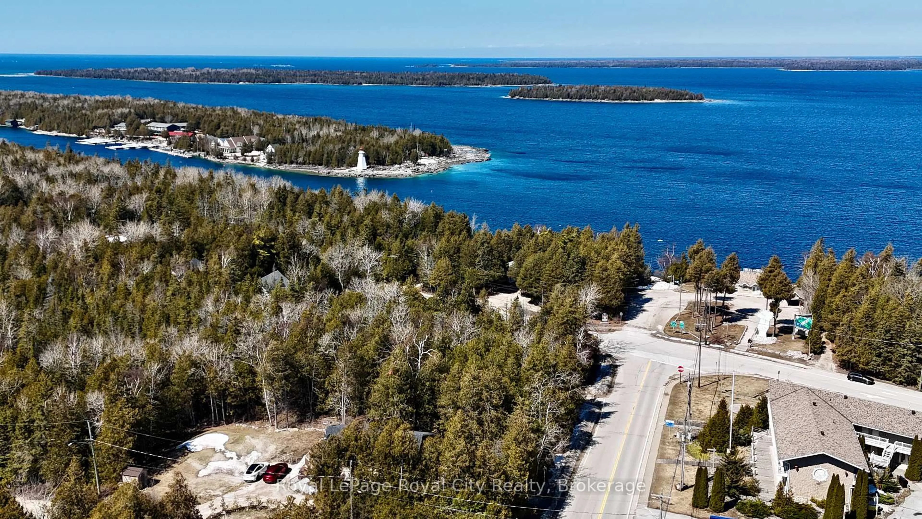 A pic from outside/outdoor area/front of a property/back of a property/a pic from drone, water/lake/river/ocean view for 4 Legion St, Northern Bruce Peninsula Ontario N0H 2R0