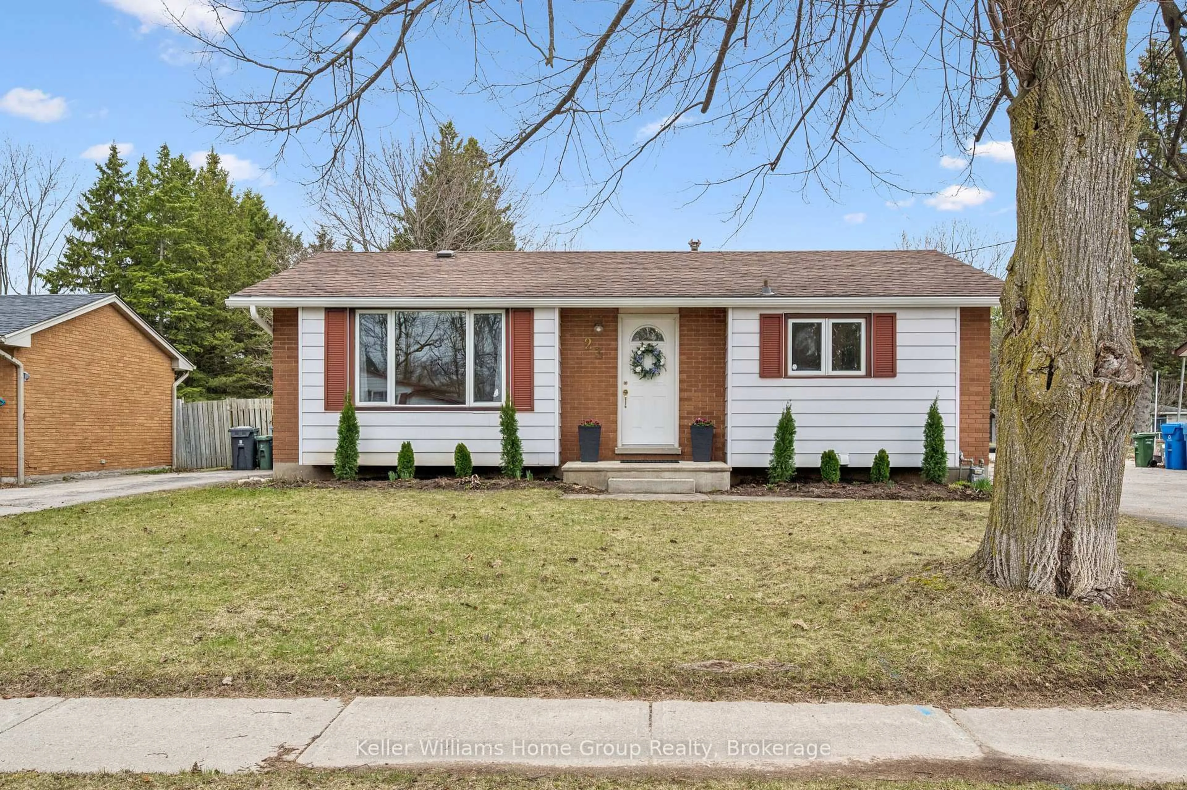 Home with vinyl exterior material, street for 23 Hastings Blvd, Guelph Ontario N1E 4G3