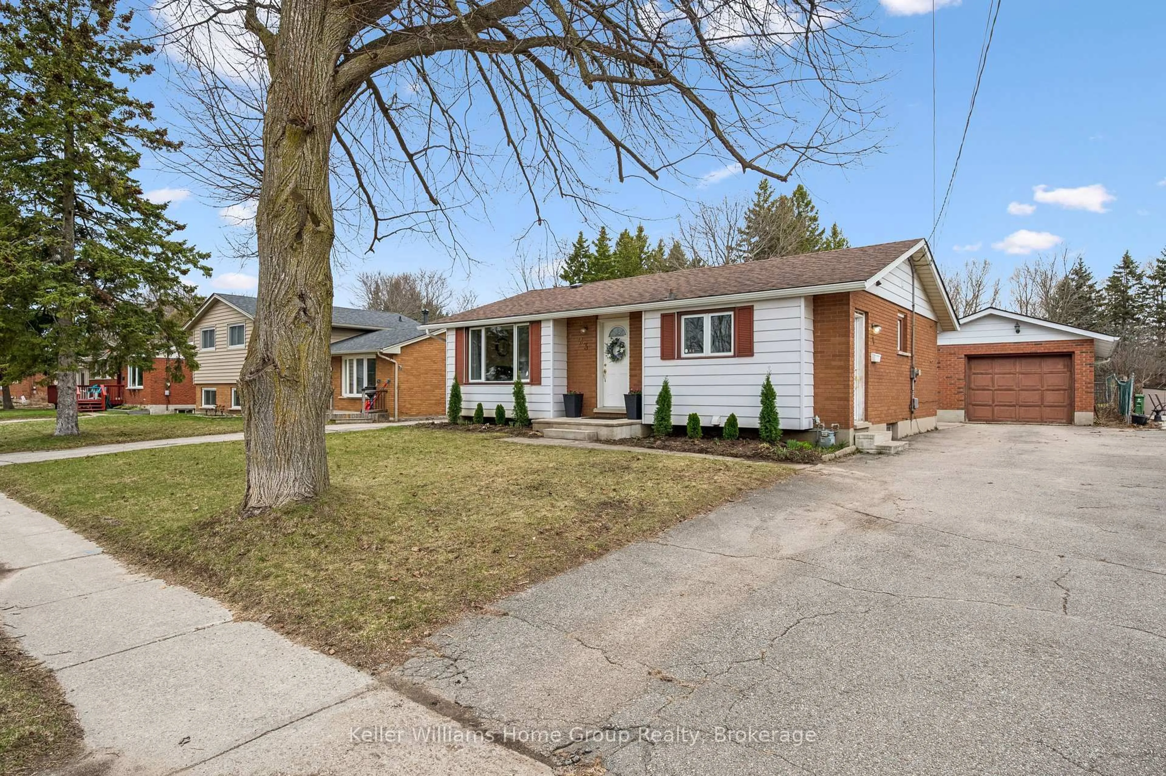 Home with brick exterior material, street for 23 Hastings Blvd, Guelph Ontario N1E 4G3