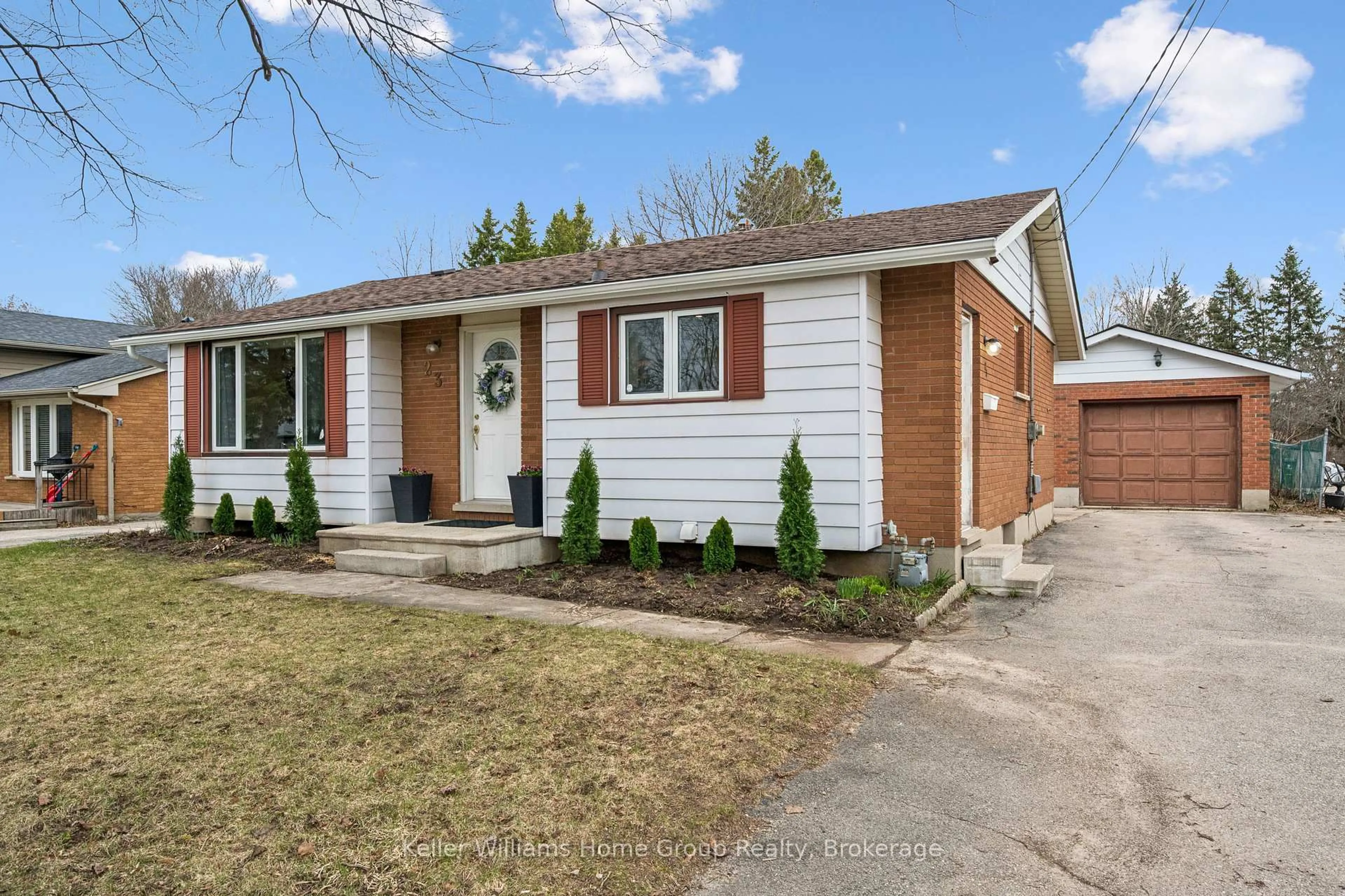 Home with brick exterior material, street for 23 Hastings Blvd, Guelph Ontario N1E 4G3