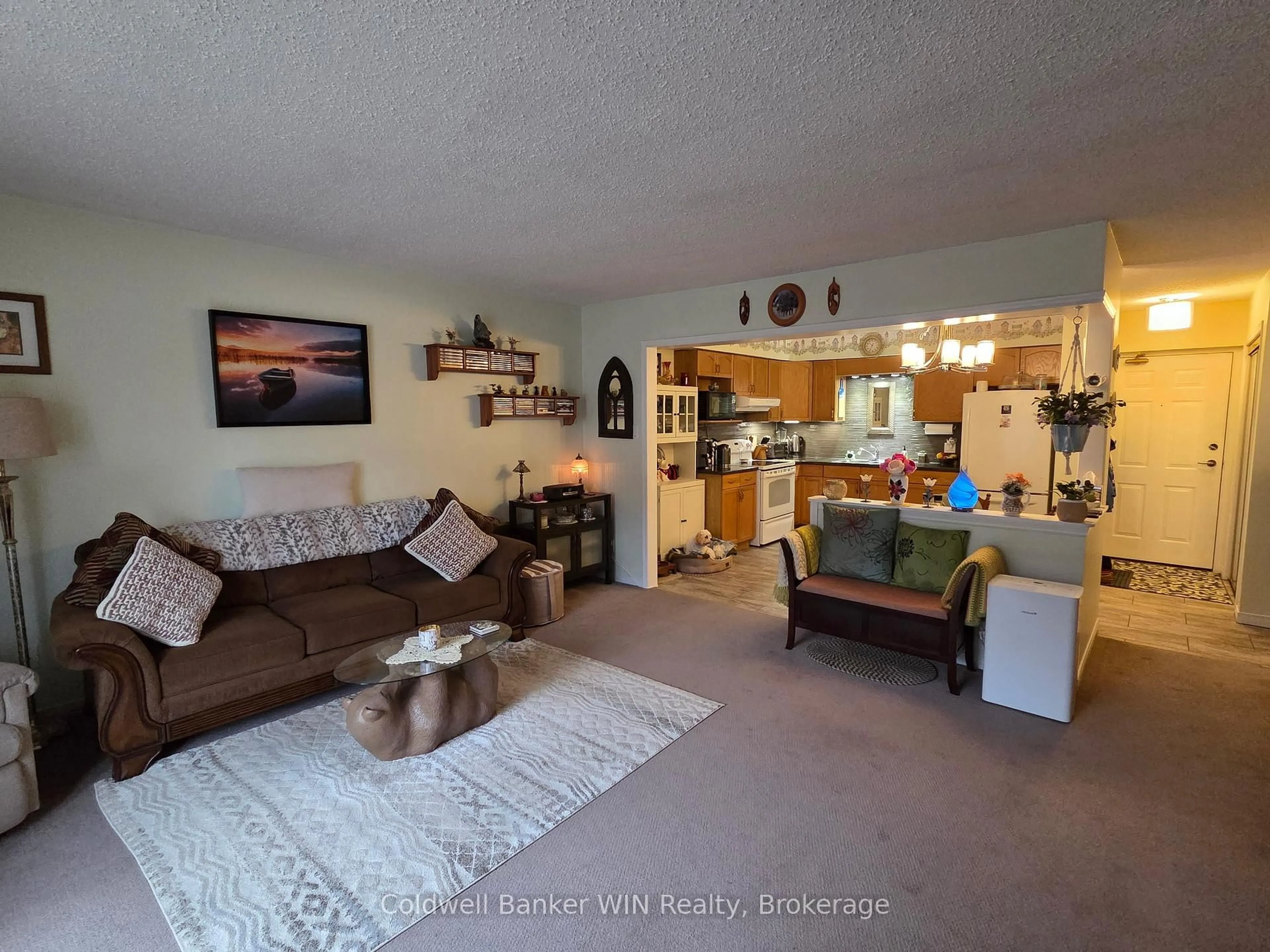 Living room with furniture, unknown for 440 Durham St #108, Wellington North Ontario N0G 2L1