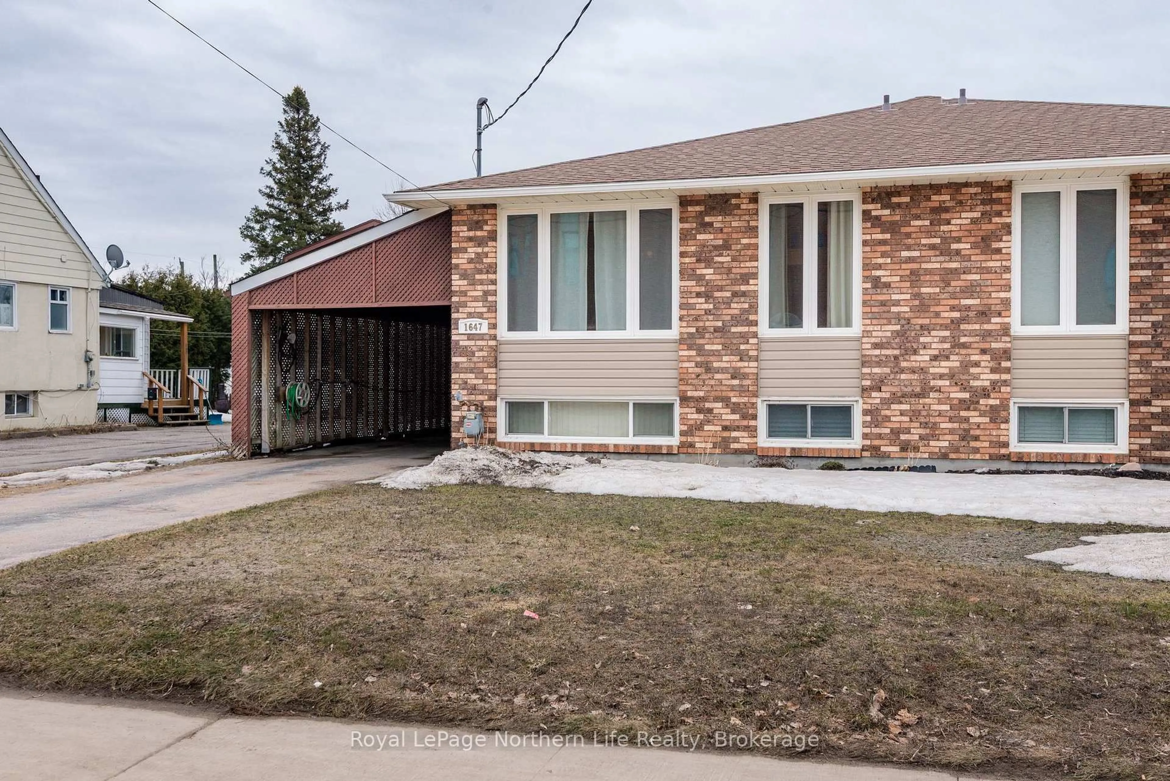 Home with brick exterior material, street for 1647 High St, North Bay Ontario P1B 6T7