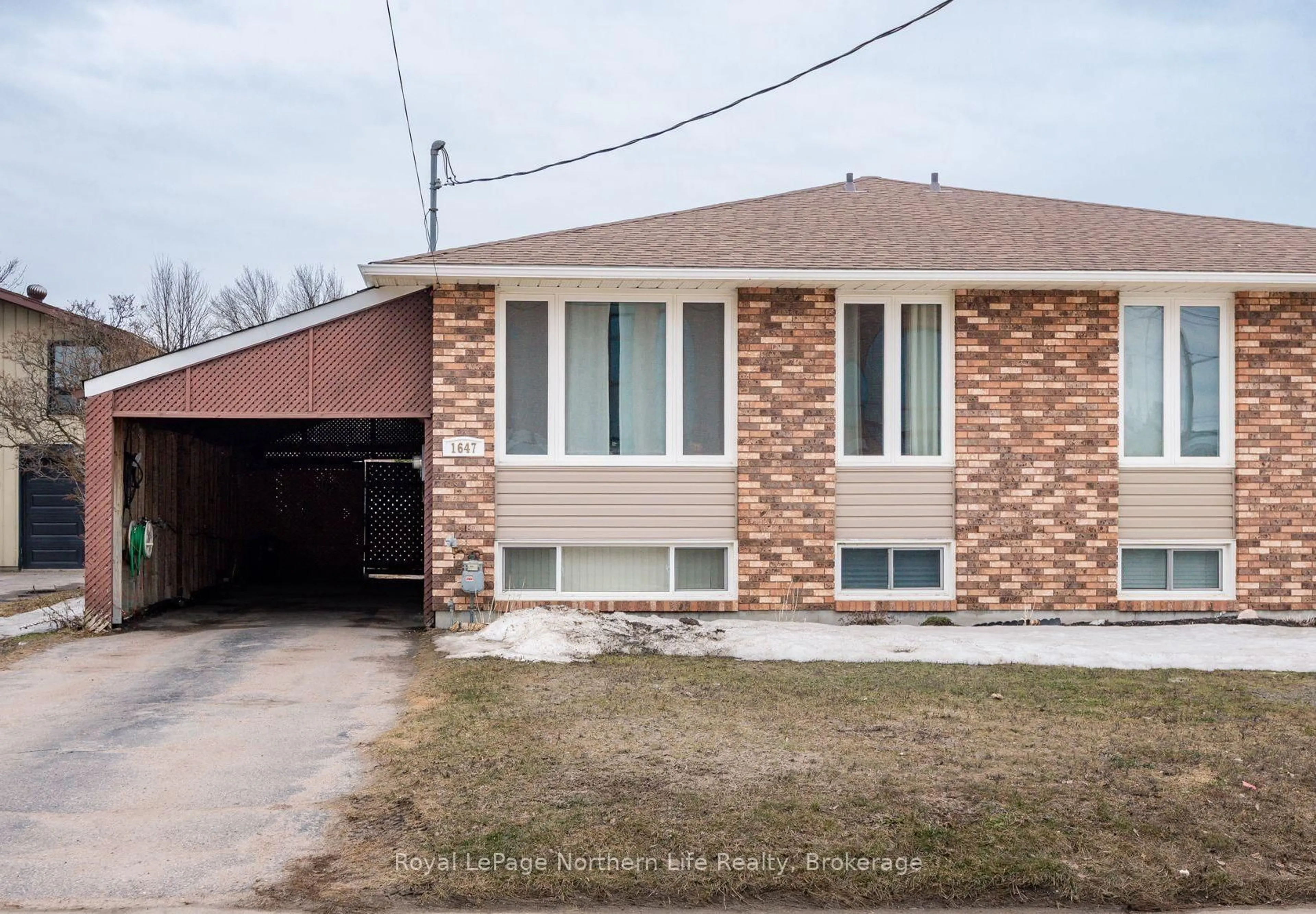 Home with brick exterior material, street for 1647 High St, North Bay Ontario P1B 6T7
