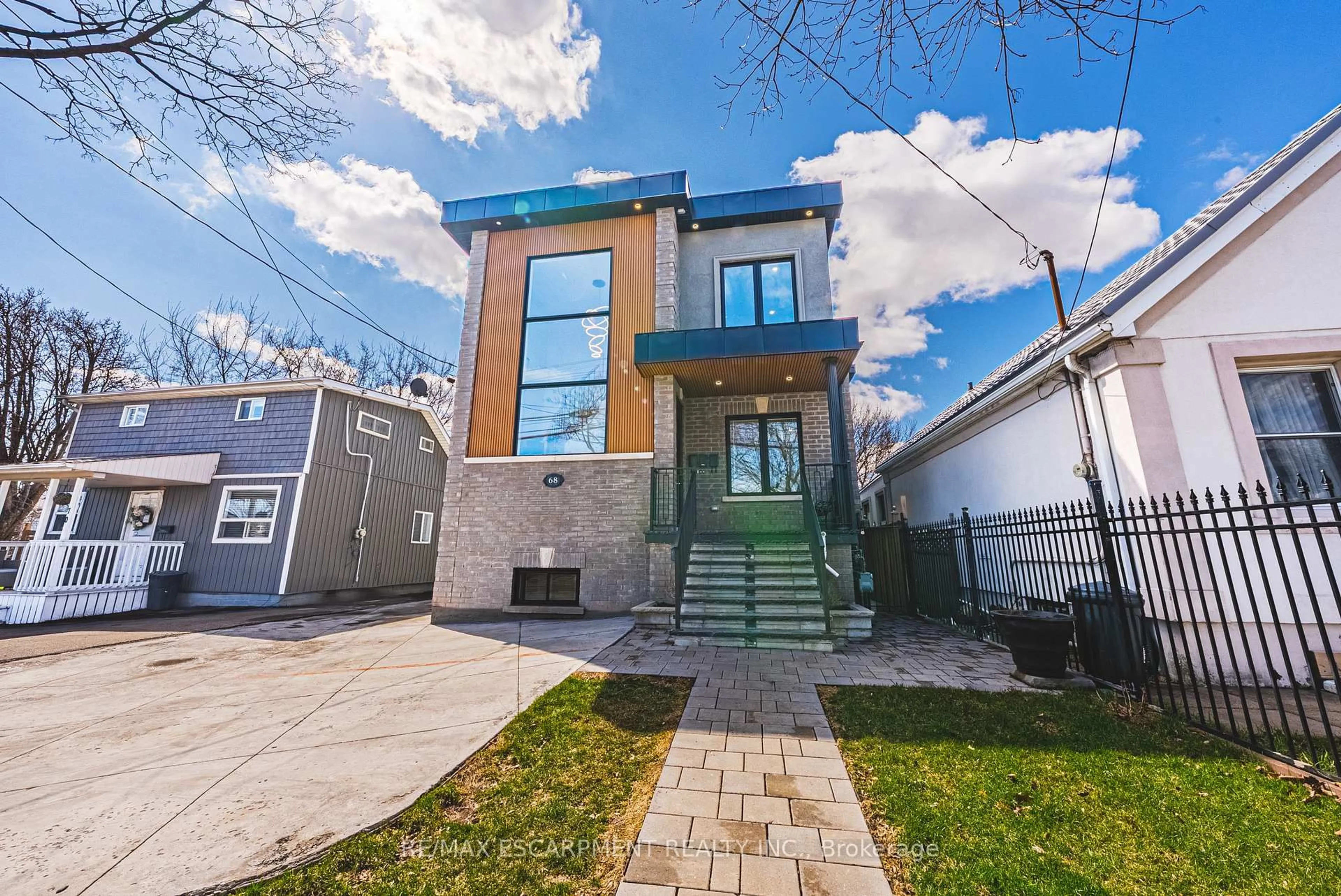 Home with brick exterior material, street for 68 Vansitmart Ave, Hamilton Ontario L8H 3A5