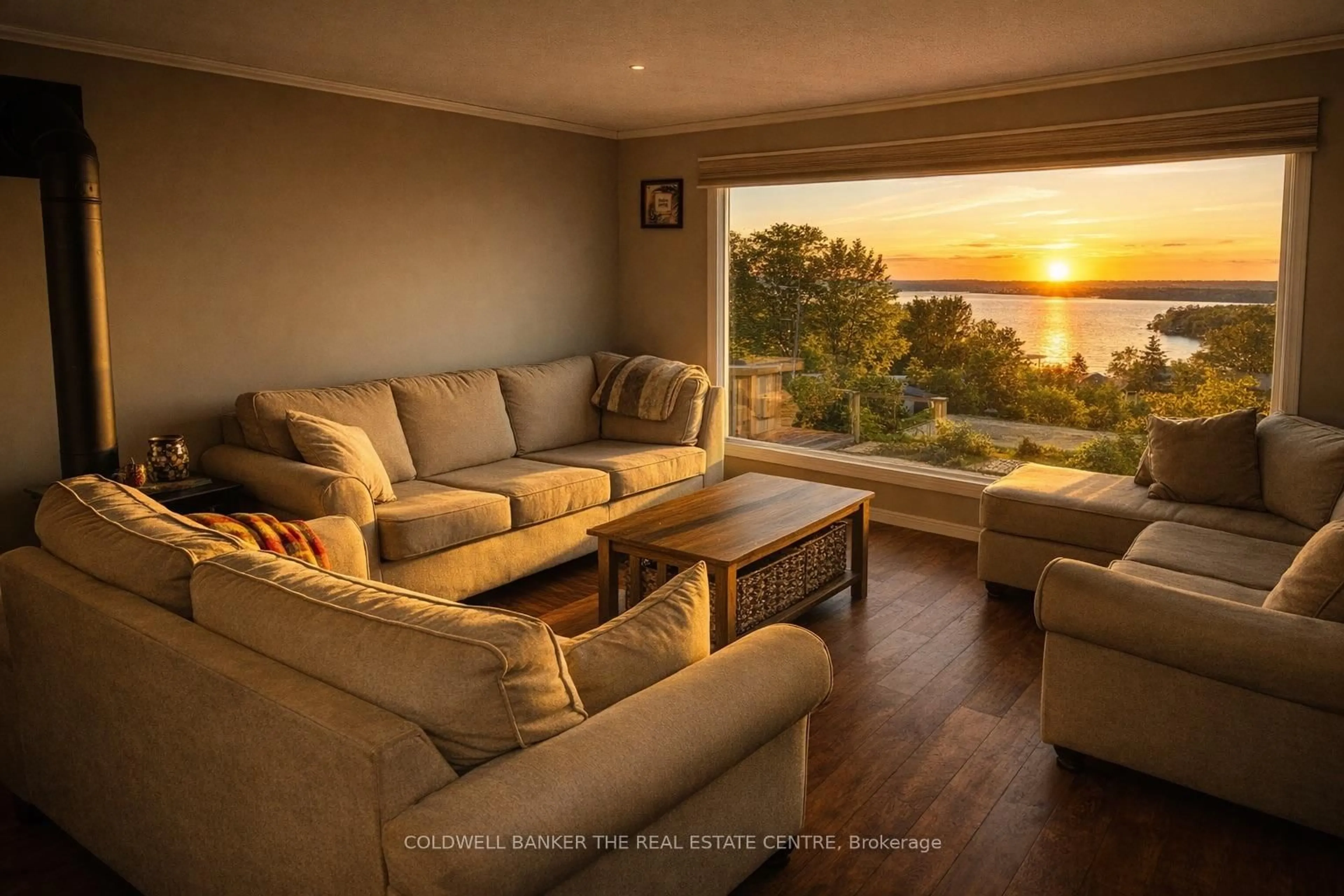 Living room with furniture, wood/laminate floor for 426 Sunset Cres, Alnwick/Haldimand Ontario K0K 2X0