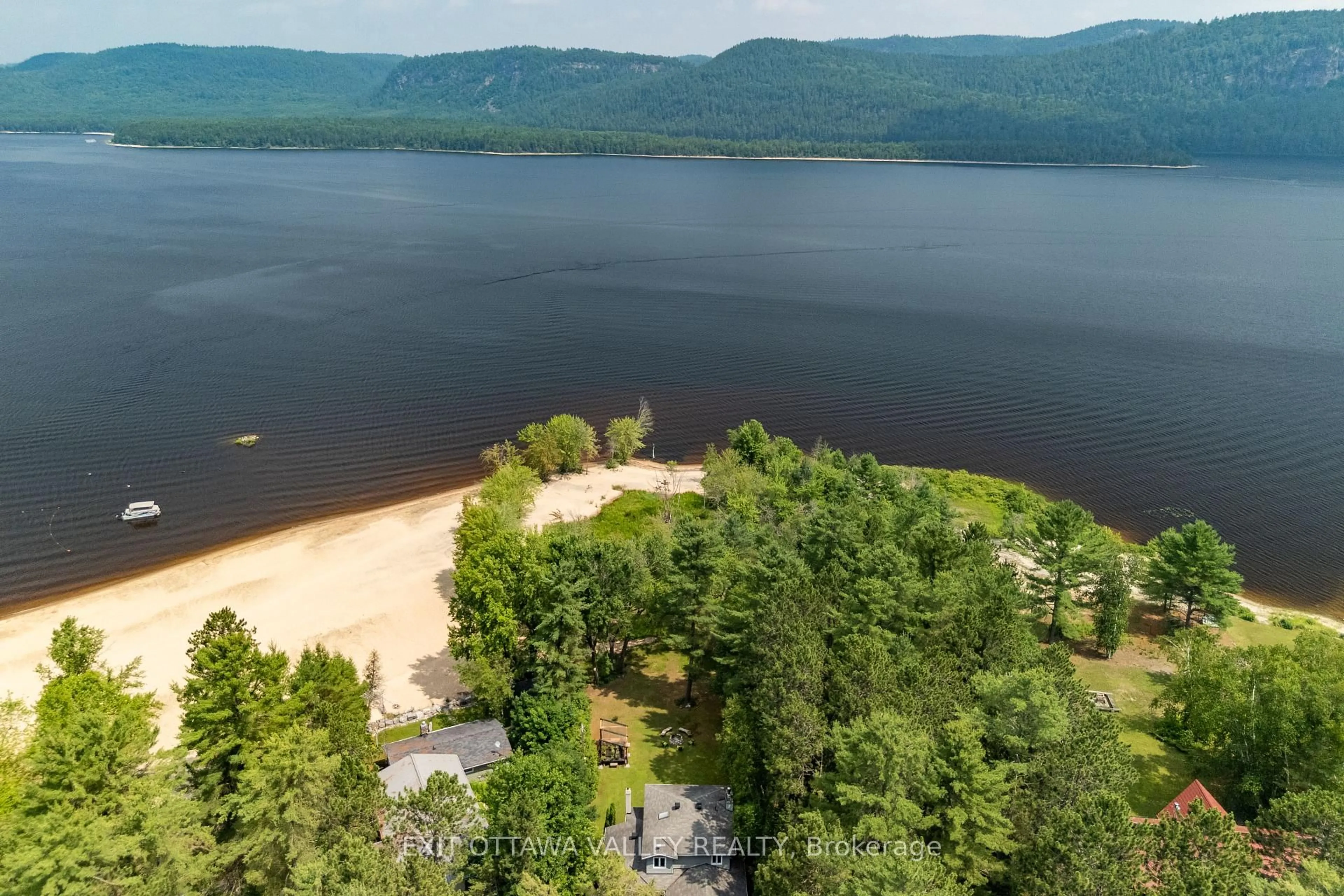 A pic from outside/outdoor area/front of a property/back of a property/a pic from drone, water/lake/river/ocean view for 10 Ryans Camp Lane, Deep River Ontario K0J 1P0