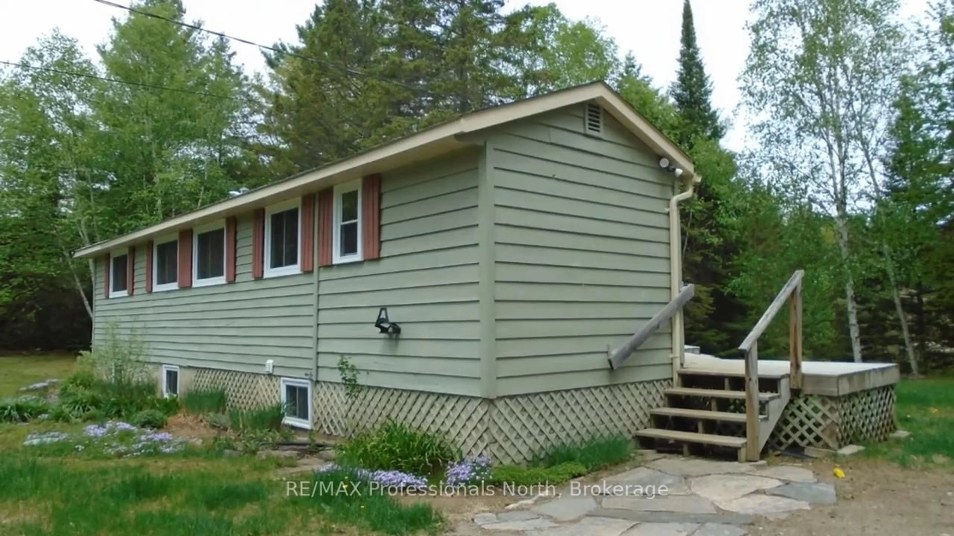 Home with vinyl exterior material, street for 1052 Ablett Crt, Algonquin Highlands Ontario K0M 1J1