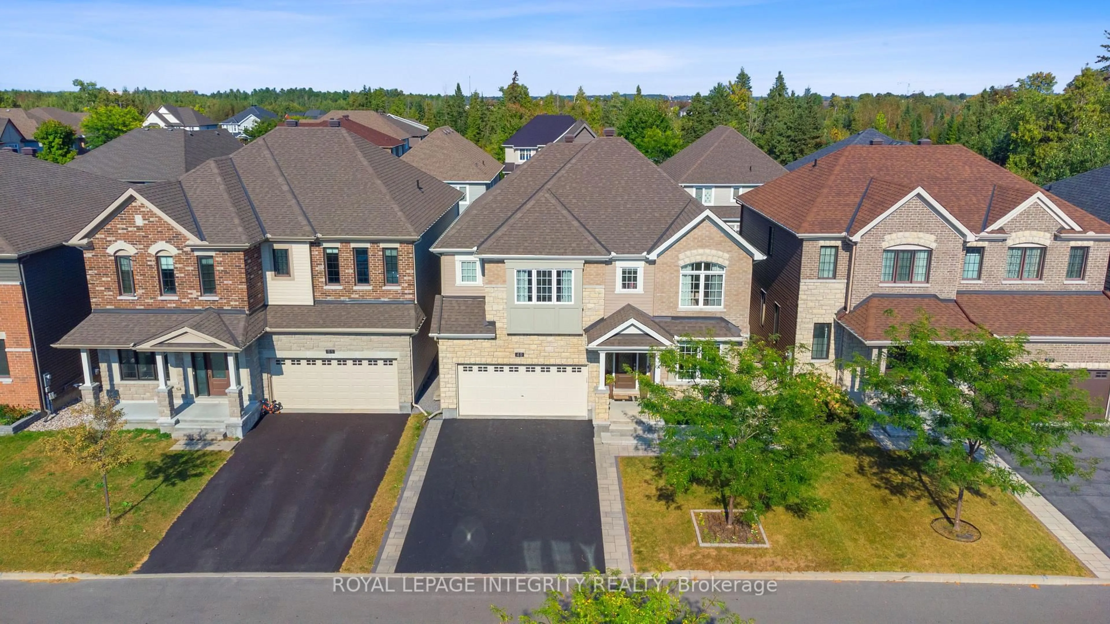 A pic from outside/outdoor area/front of a property/back of a property/a pic from drone, street for 49 Hawks Landing Cres, Stittsville Ontario K2S 1W1