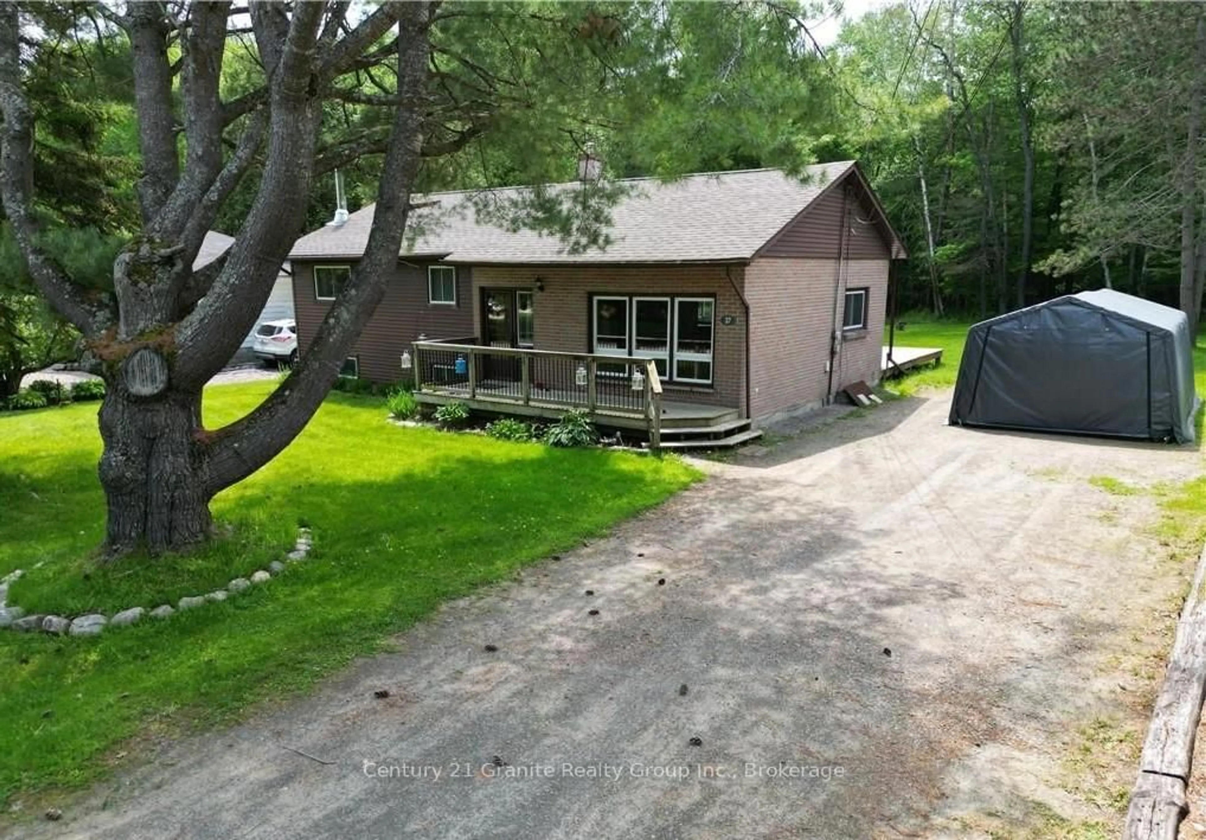 A pic from outside/outdoor area/front of a property/back of a property/a pic from drone, unknown for 37 Mckay St, Minden Hills Ontario K0M 2K0