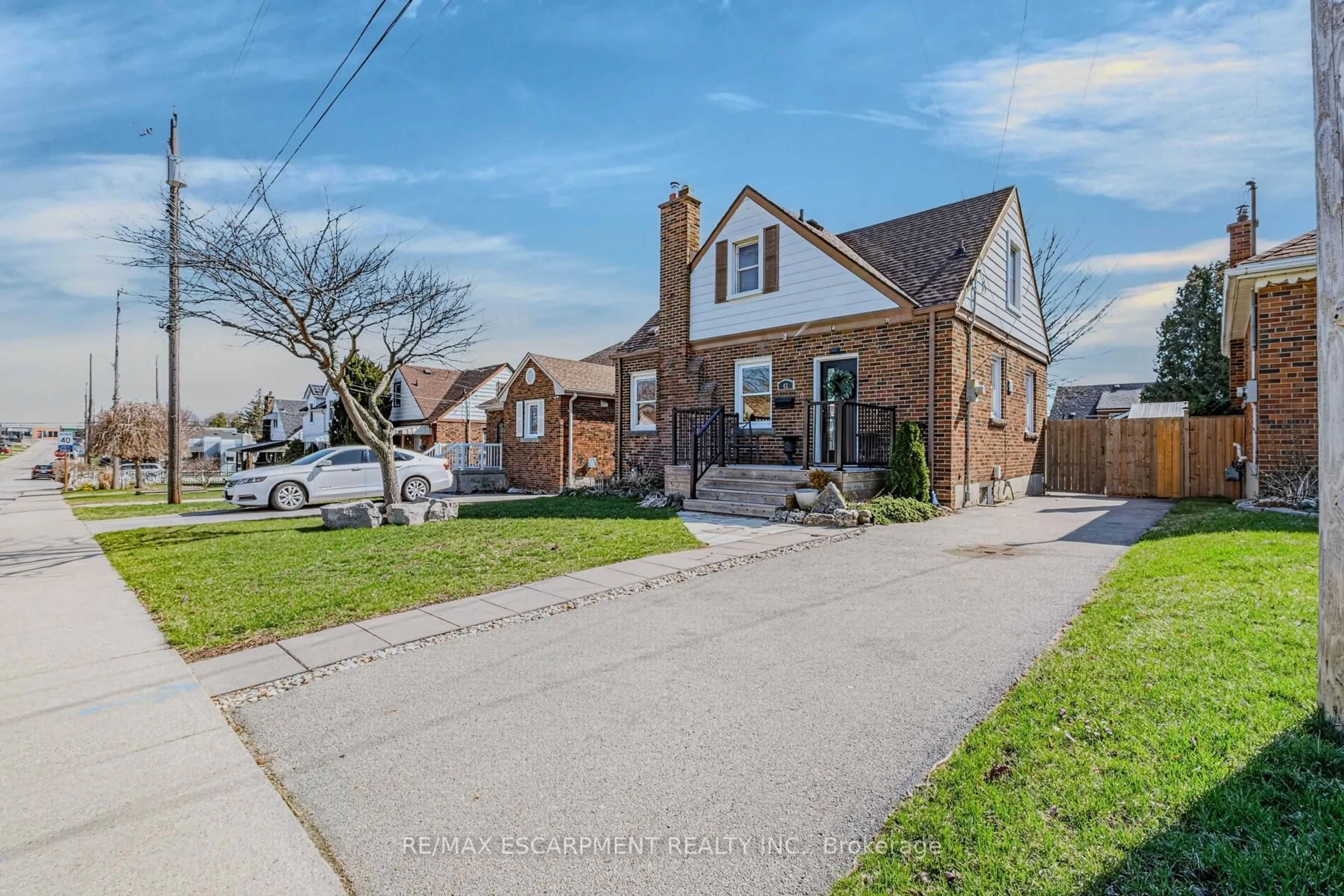 Home with brick exterior material, street for 43 Woodbridge Rd, Hamilton Ontario L8K 3C8