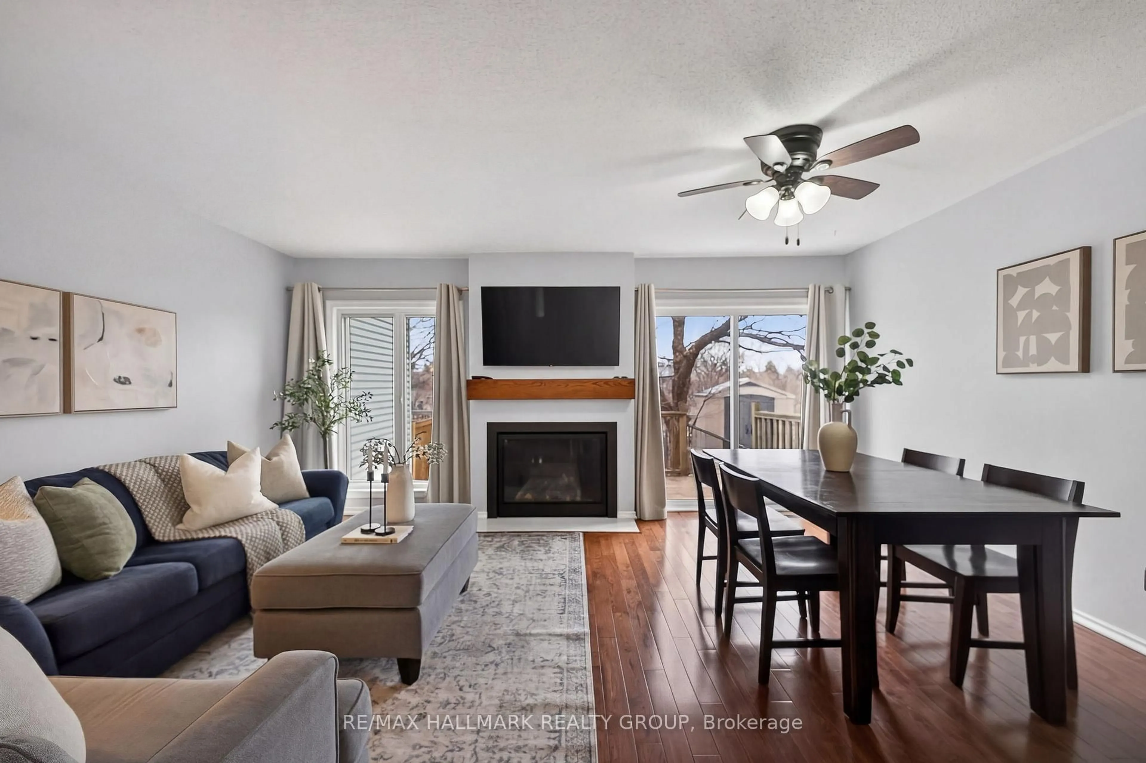 Living room with furniture, wood/laminate floor for 80 PICKWICK Dr, Ottawa Ontario K2J 3E2