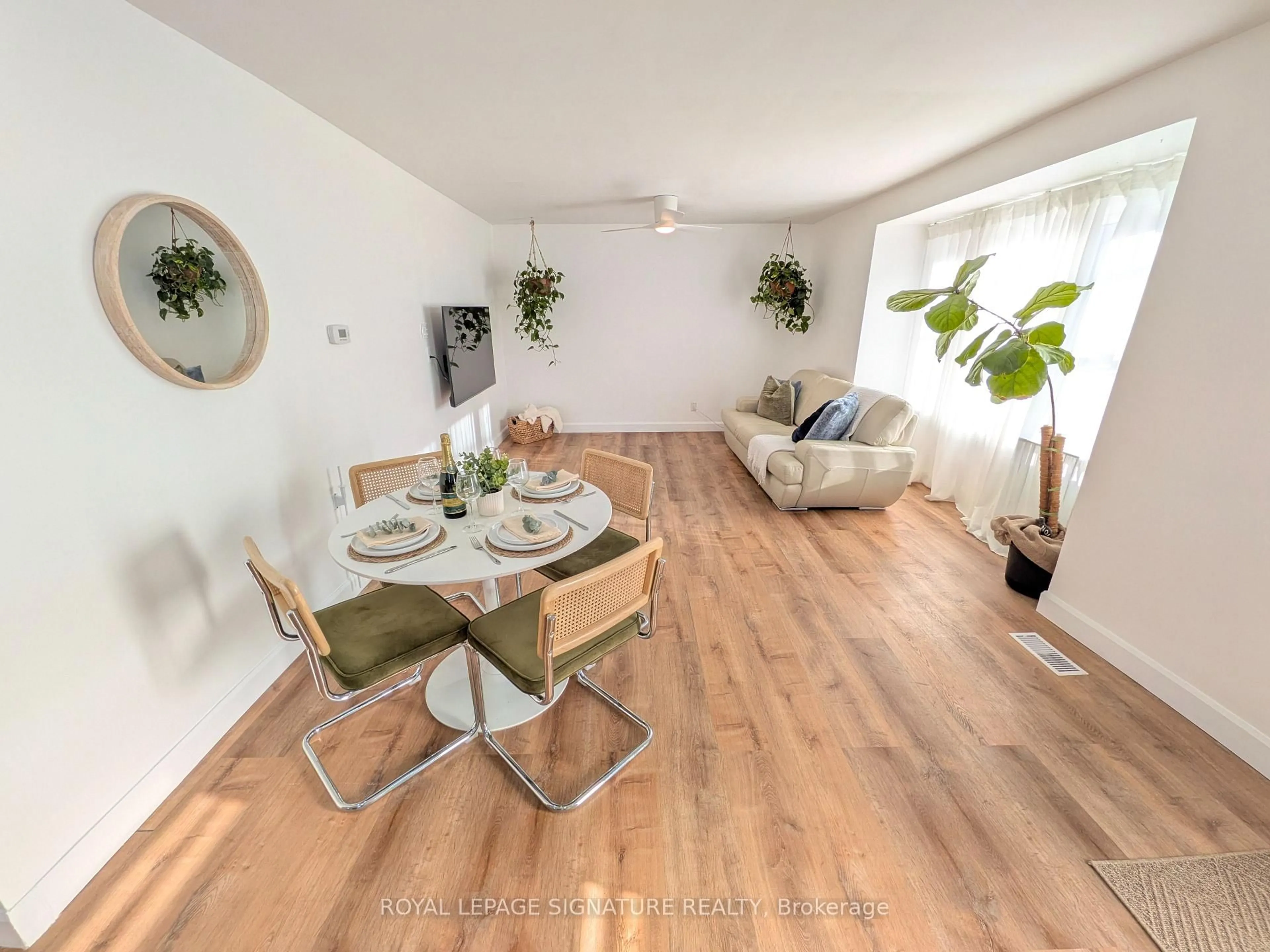 Living room with furniture, wood/laminate floor for 524 Burnham St, Cobourg Ontario K9A 2W7