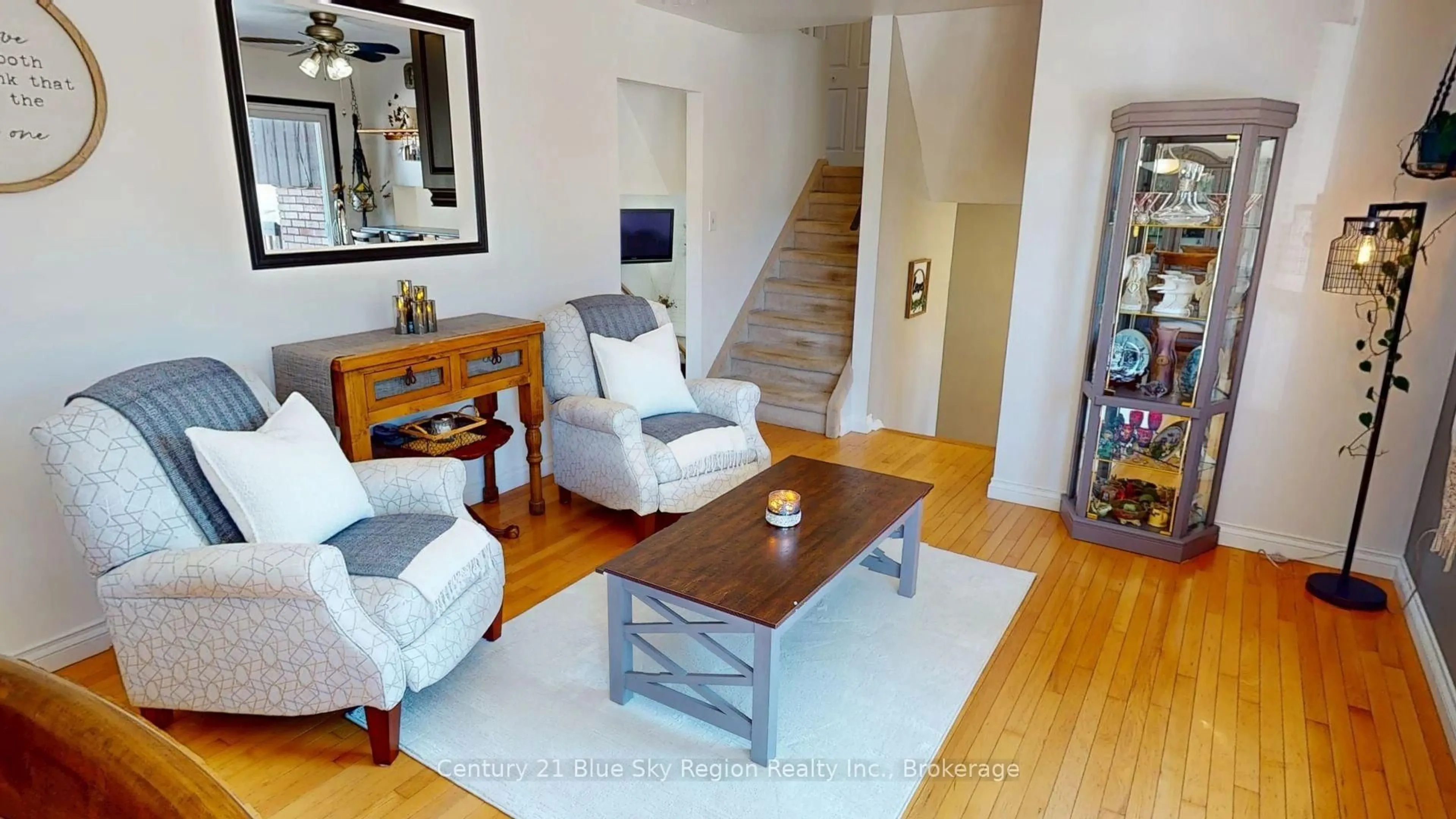 Living room with furniture, wood/laminate floor for 25 Carriage Cres, North Bay Ontario P1C 1G5