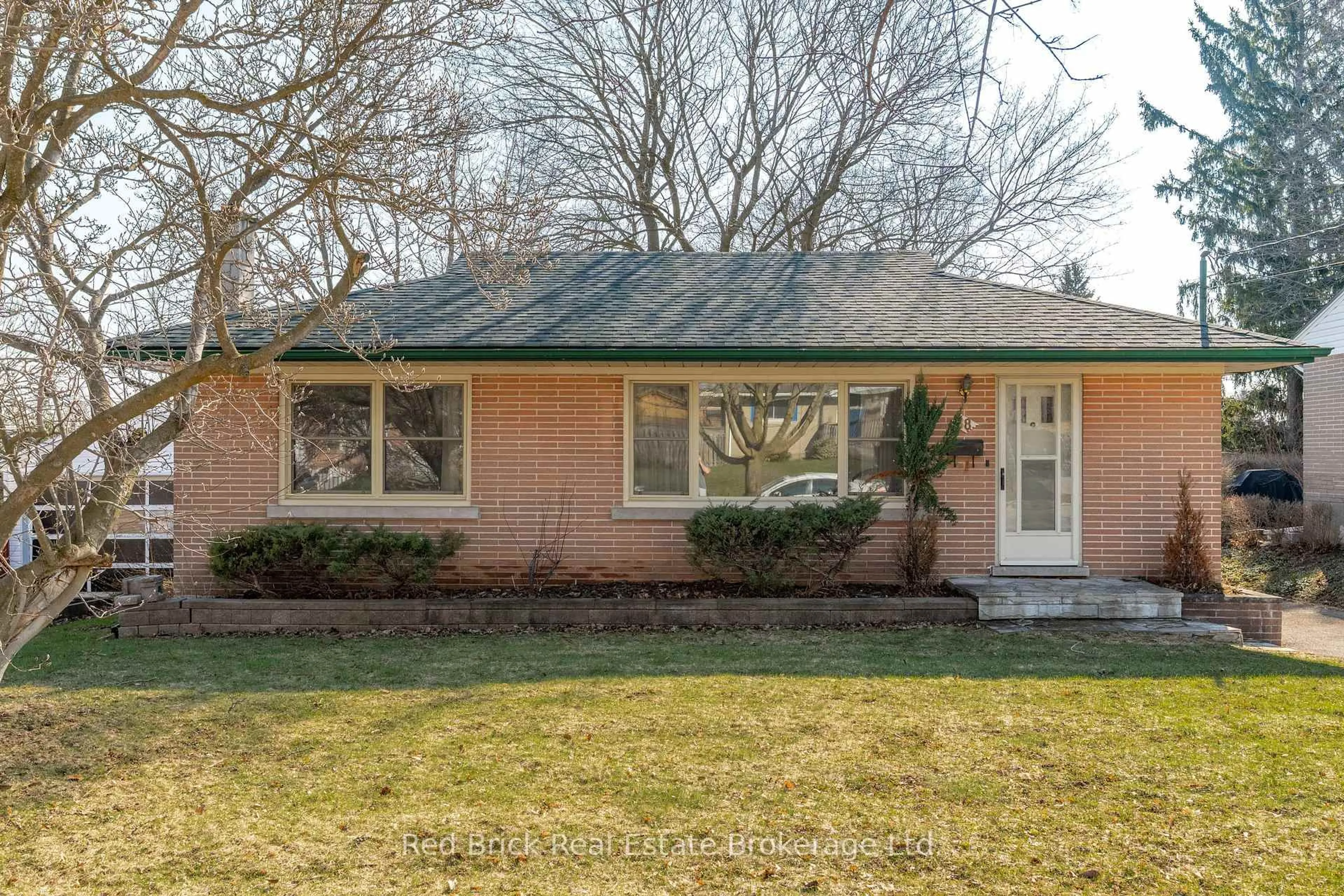 Home with brick exterior material, street for 38 Dumbarton St, Guelph Ontario N1E 3T3