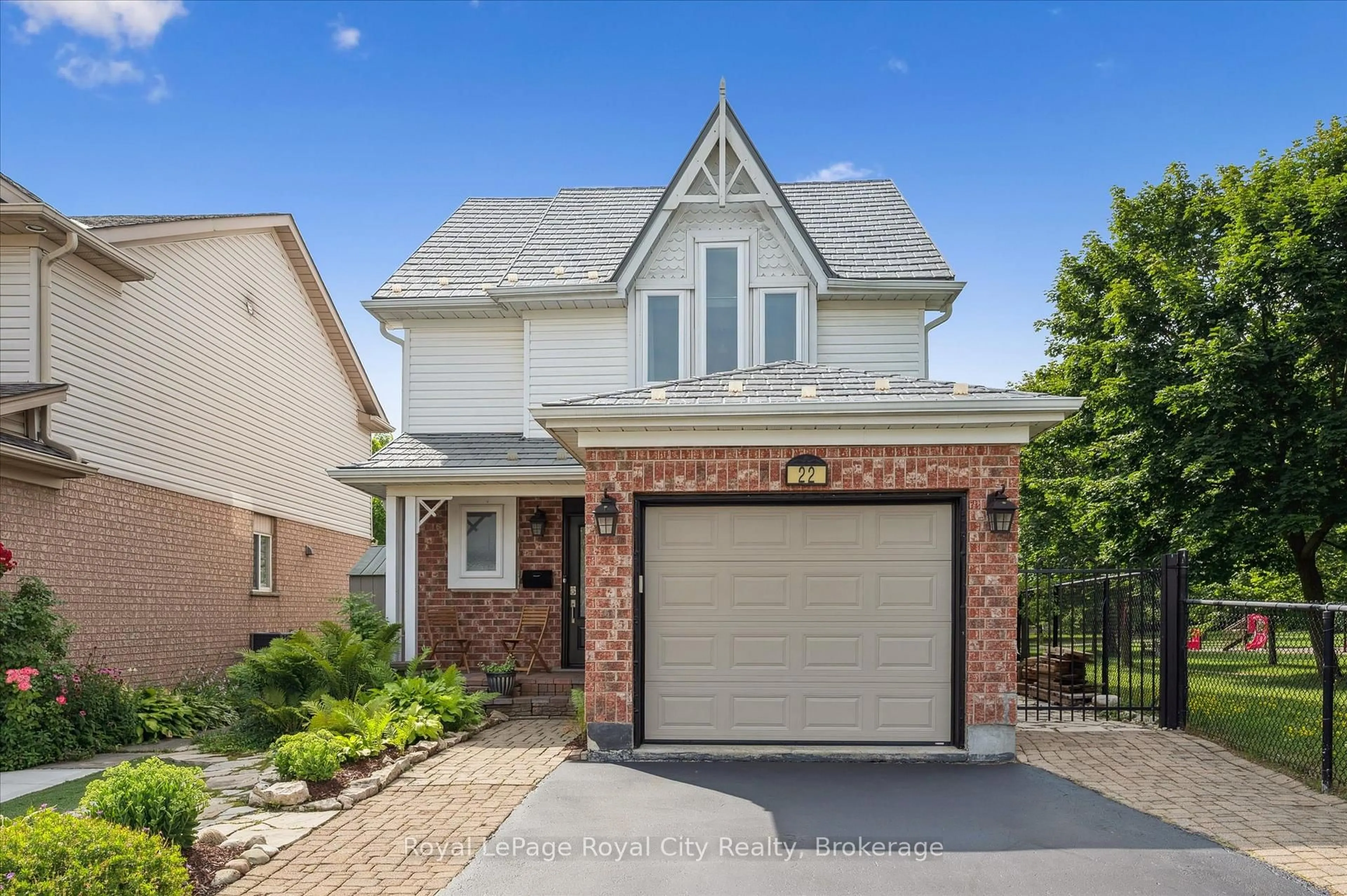 Home with brick exterior material, street for 22 Thompson Dr, Guelph Ontario N1E 7A5