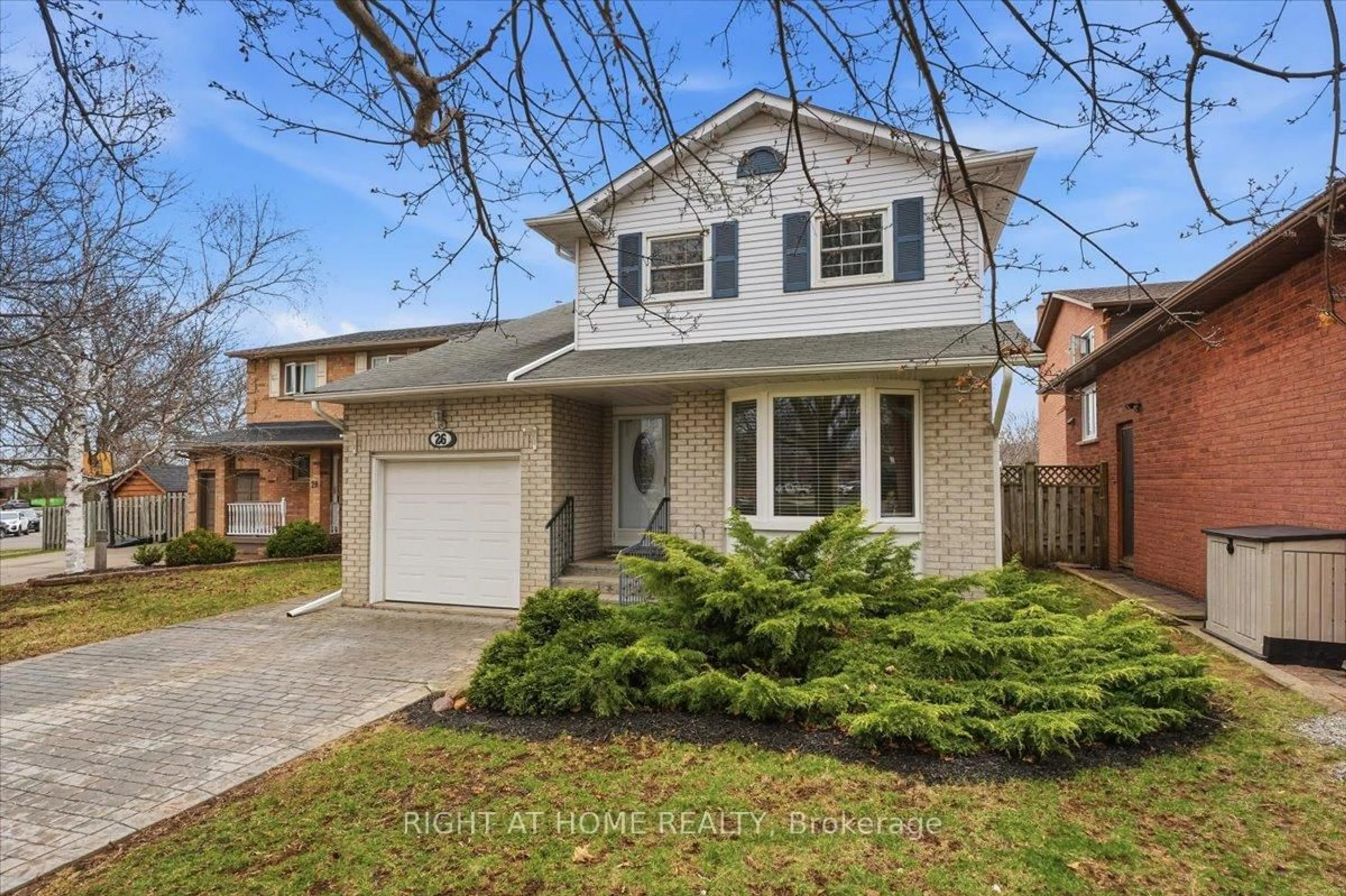 Home with brick exterior material, street for 26 Ellington Ave, Hamilton Ontario L8E 4E9