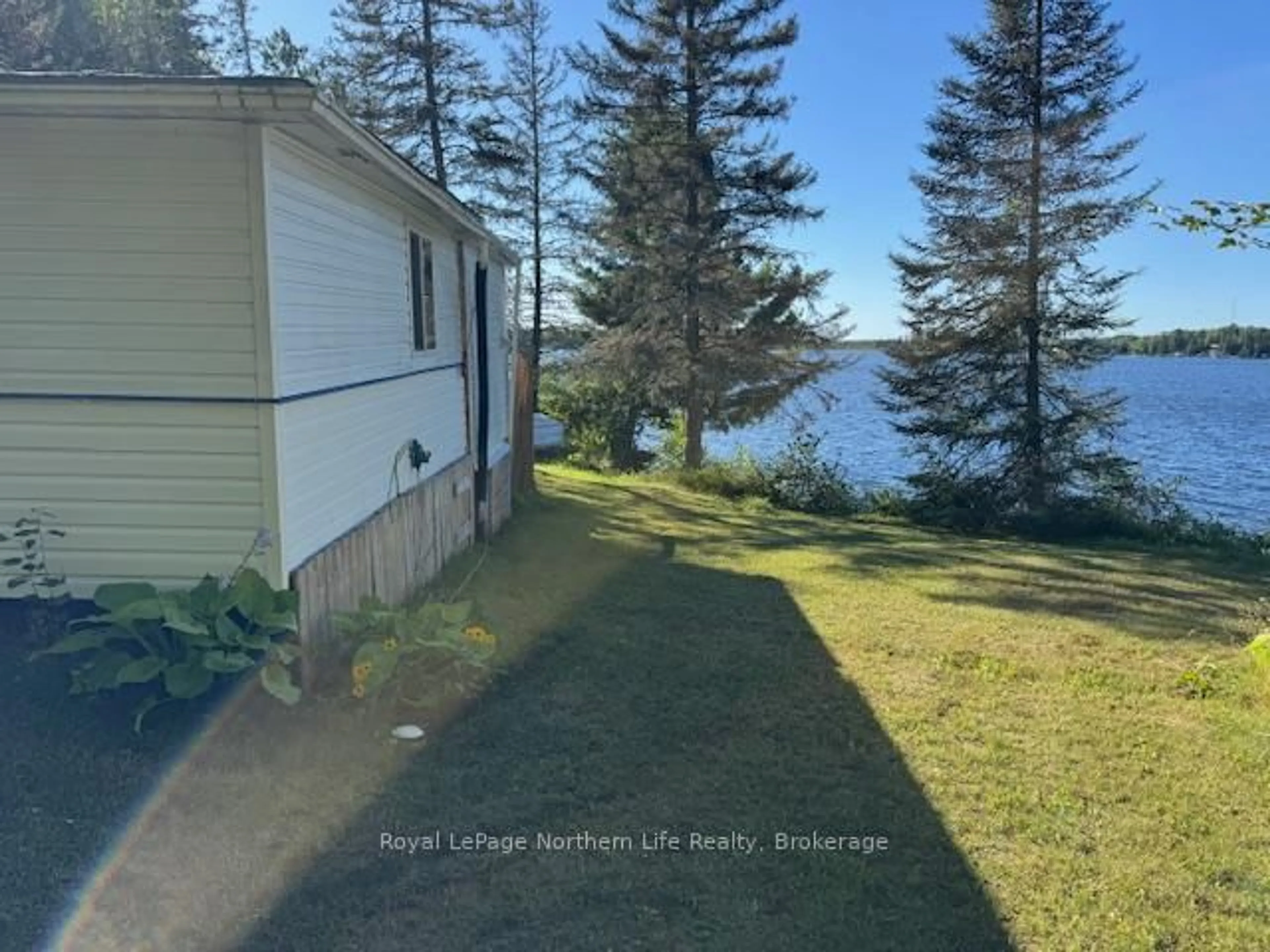 A pic from outside/outdoor area/front of a property/back of a property/a pic from drone, water/lake/river/ocean view for 61 Guenette Rd, West Nipissing Ontario P0M 2M0