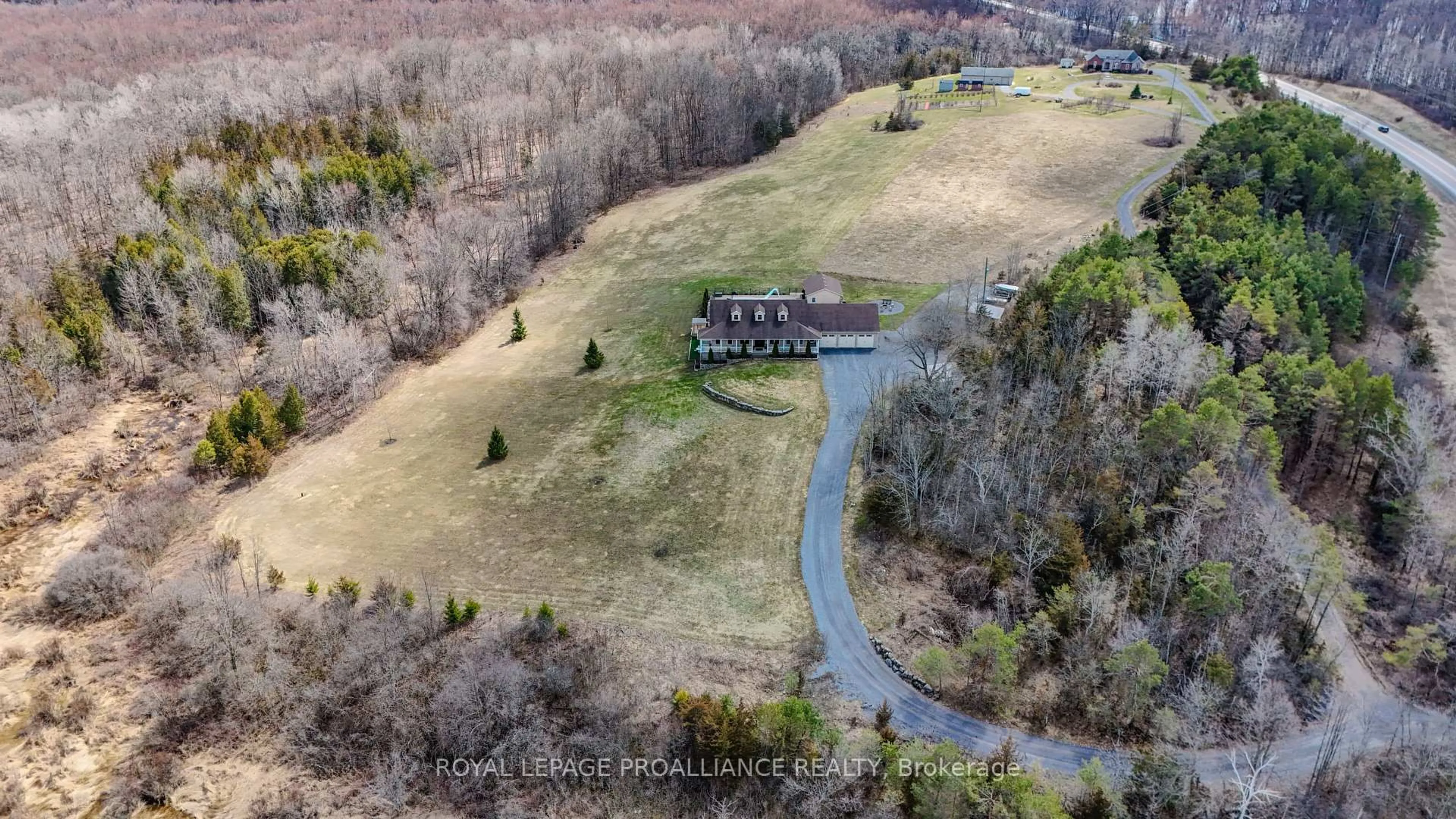 A pic from outside/outdoor area/front of a property/back of a property/a pic from drone, water/lake/river/ocean view for 2104 Highway 37 #A, Belleville Ontario K0K 2V0