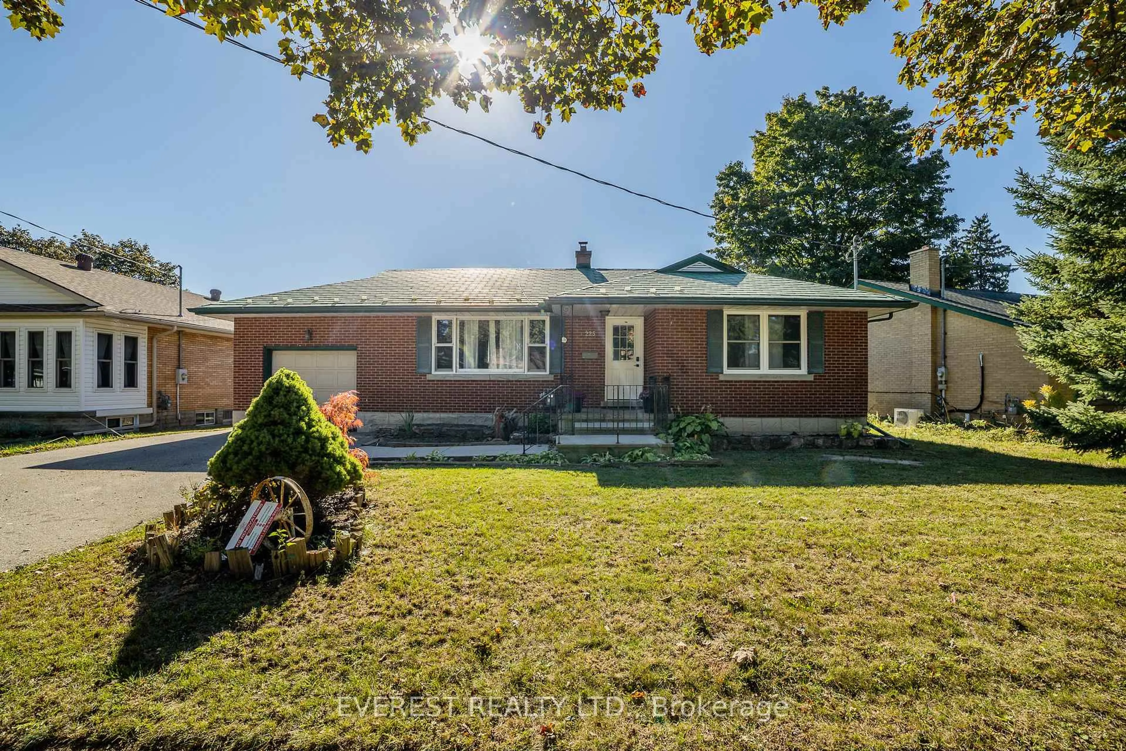 Home with brick exterior material, street for 225 Woodhaven Rd, Kitchener Ontario N2C 1V6