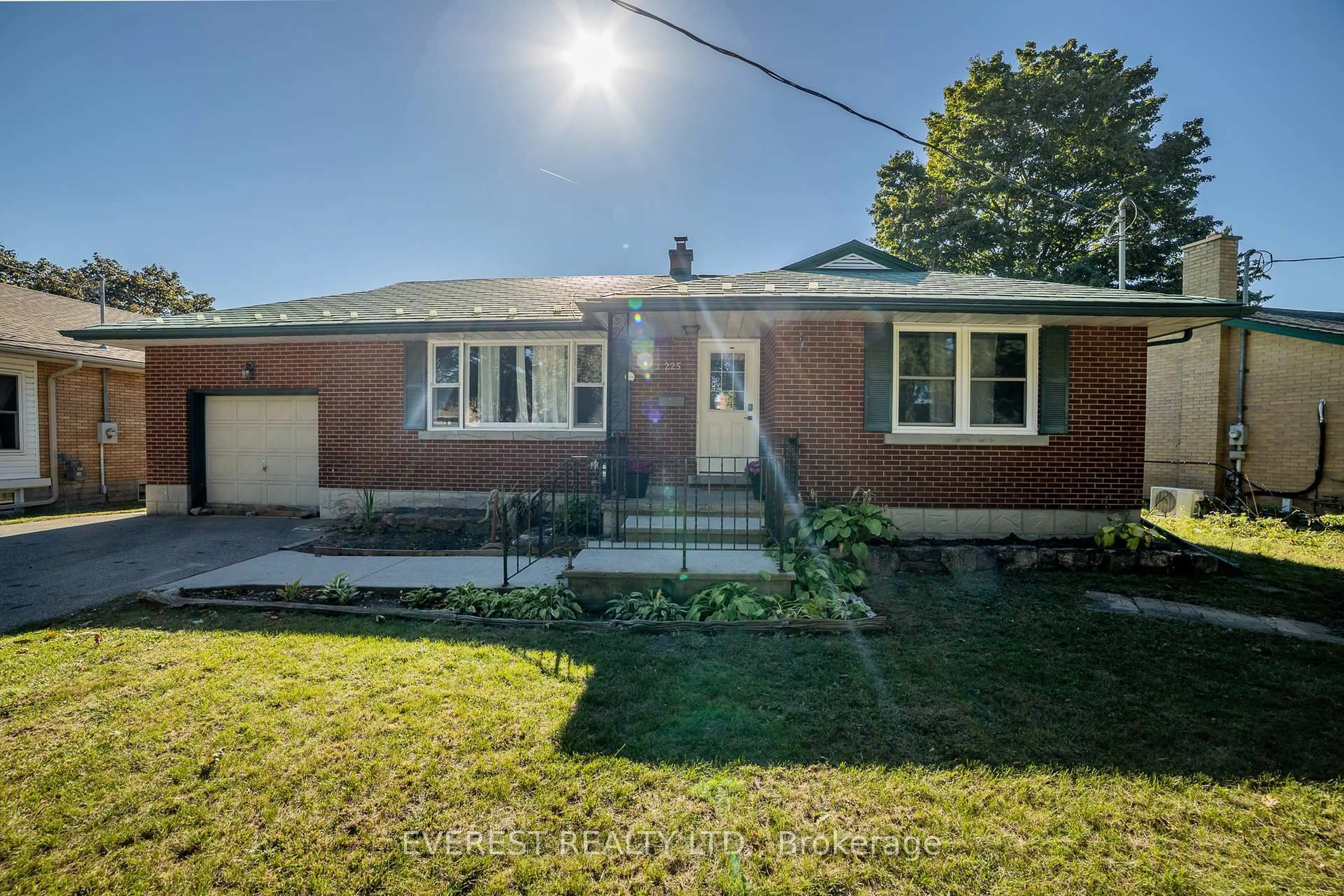 Home with brick exterior material, street for 225 Woodhaven Rd, Kitchener Ontario N2C 1V6