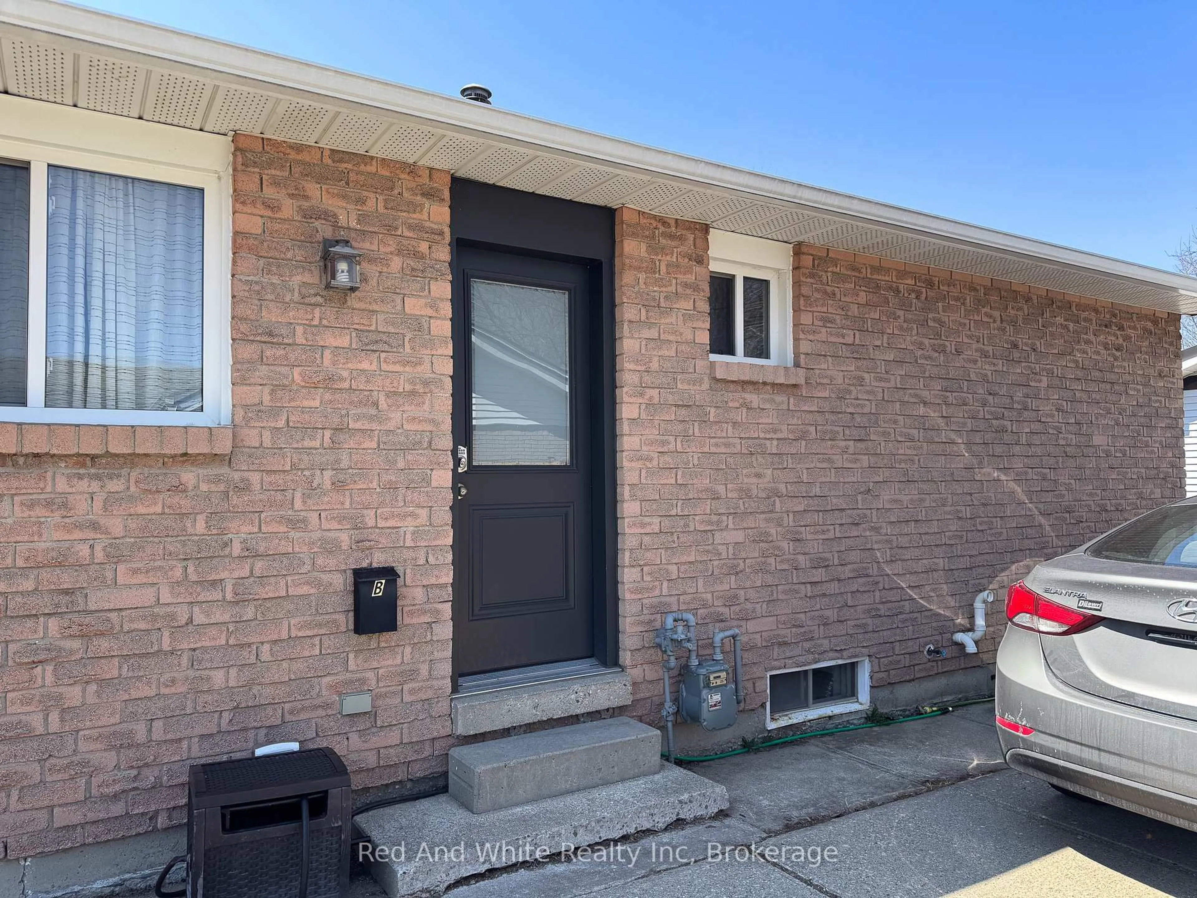 Home with brick exterior material, street for 96 PATHFINDER Cres, Kitchener Ontario N2P 1S6