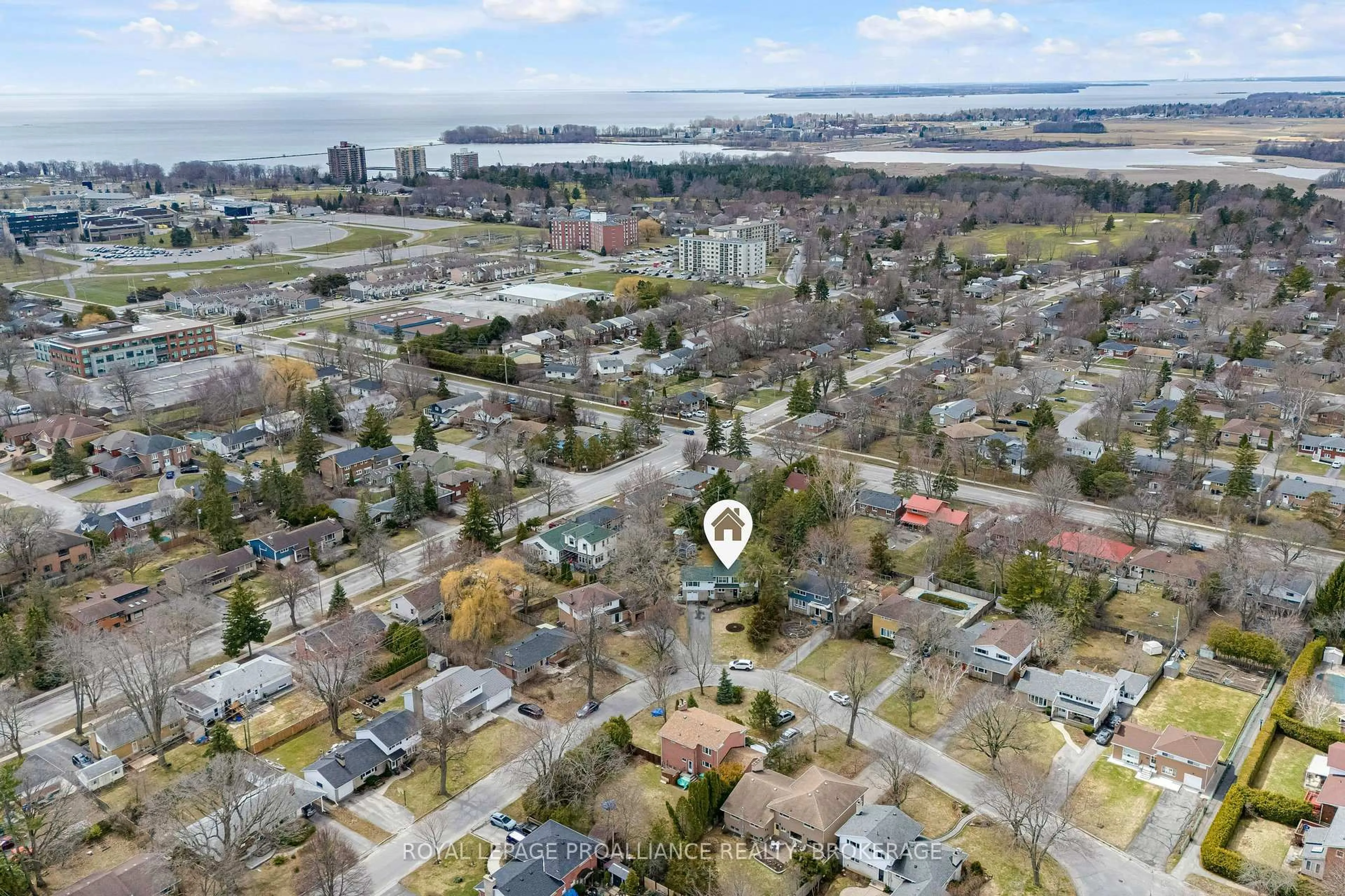 A pic from outside/outdoor area/front of a property/back of a property/a pic from drone, water/lake/river/ocean view for 46 Watts Cres, Kingston Ontario K7M 2P3