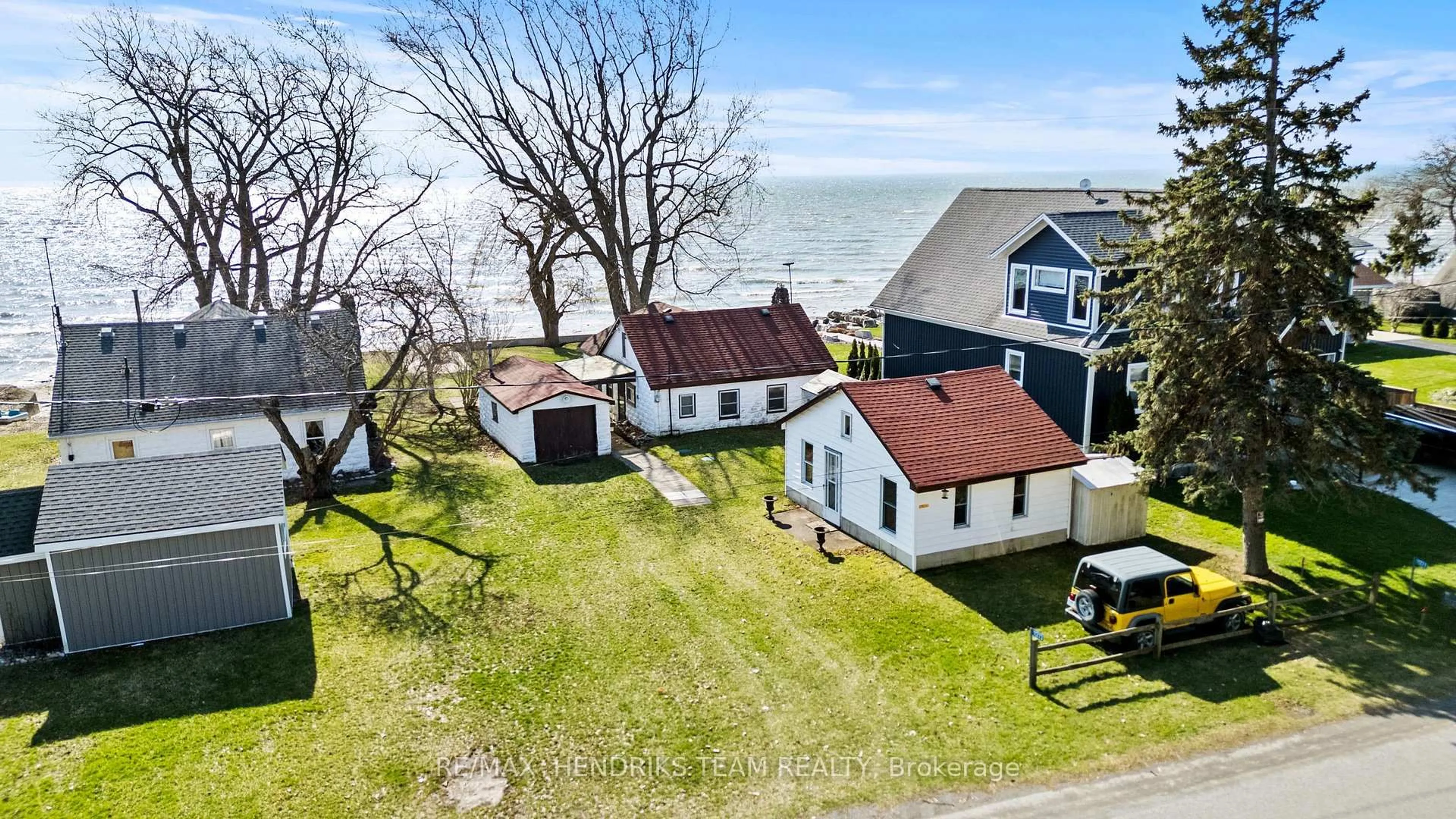 A pic from outside/outdoor area/front of a property/back of a property/a pic from drone, water/lake/river/ocean view for 11273 Harbourview Rd, Wainfleet Ontario L3K 5V4