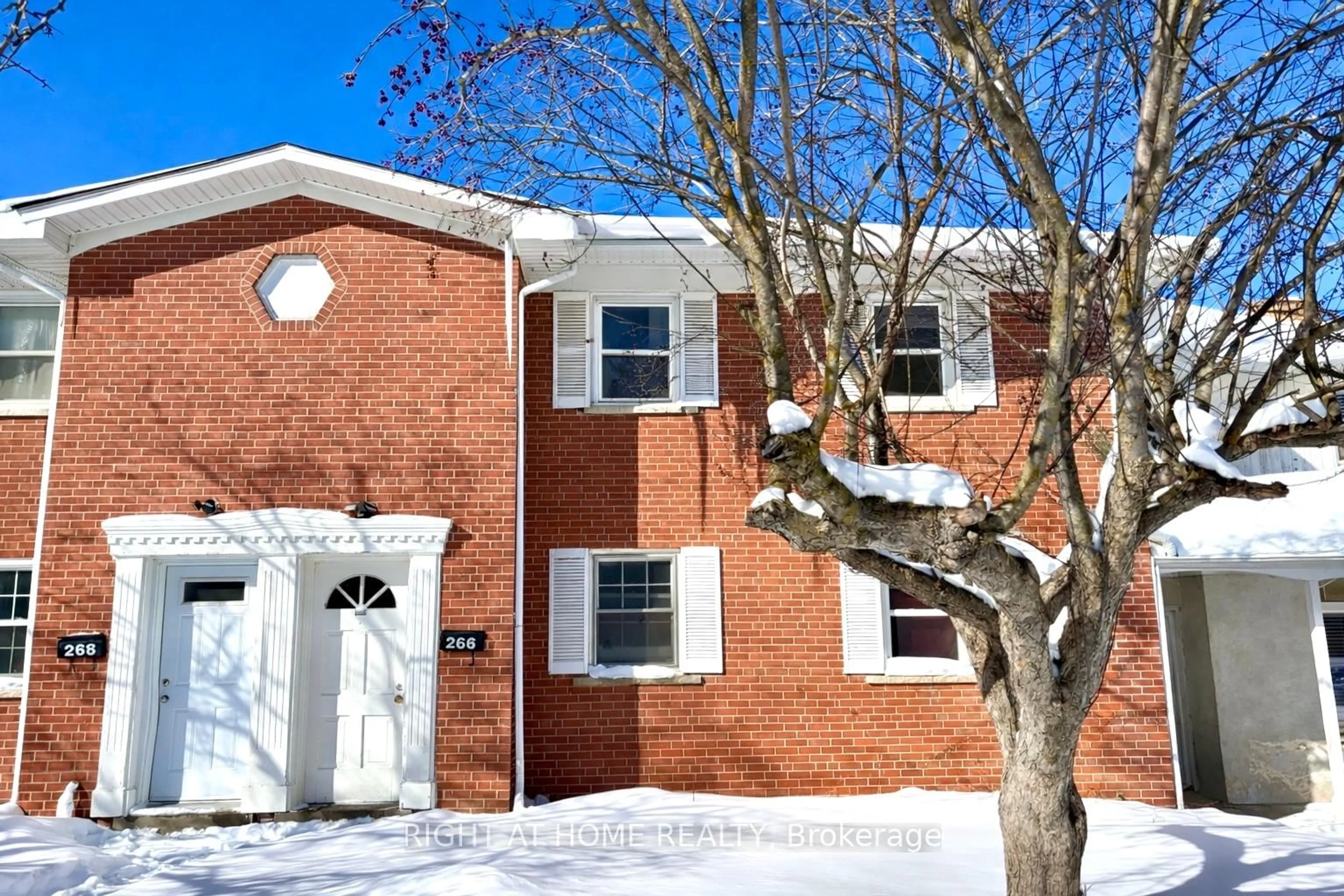 Home with brick exterior material, street for 266 Westcourt Pl, Waterloo Ontario N2L 2R7