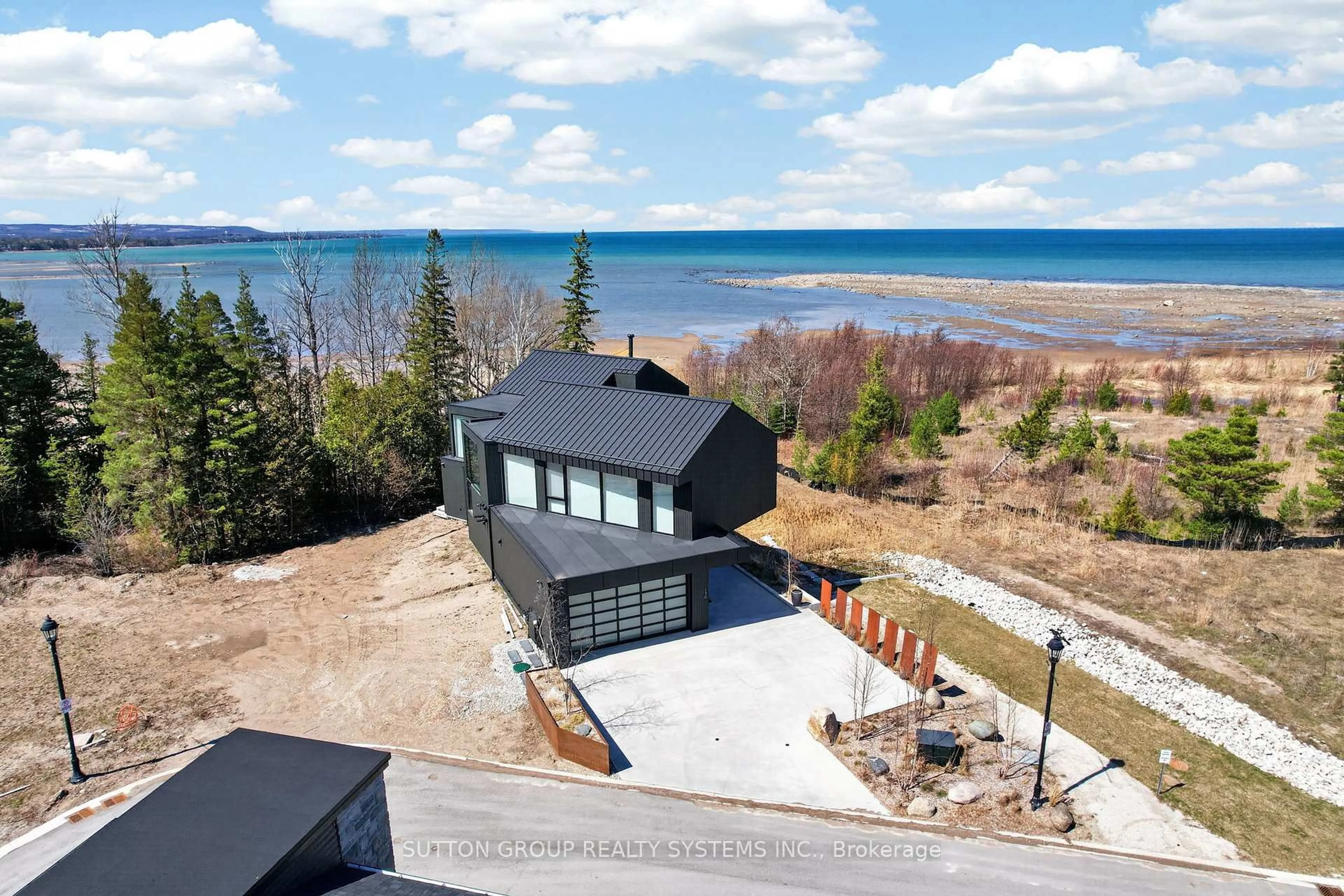 A pic from outside/outdoor area/front of a property/back of a property/a pic from drone, water/lake/river/ocean view for 120 Sebastian St, Blue Mountains Ontario N0H 1J0
