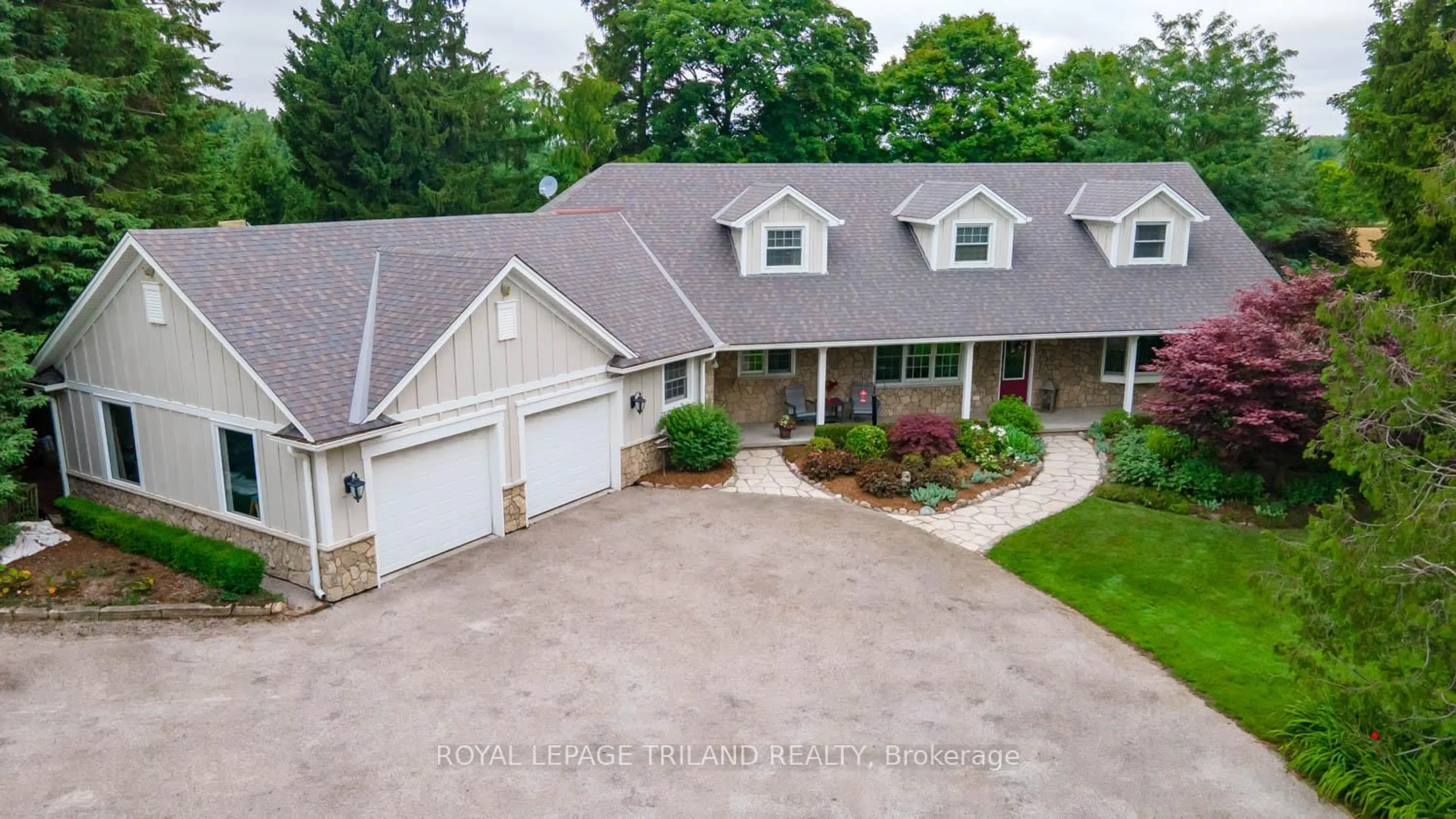 A pic from outside/outdoor area/front of a property/back of a property/a pic from drone, unknown for 2416 Sunningdale Rd, Middlesex Centre Ontario N6H 5L2