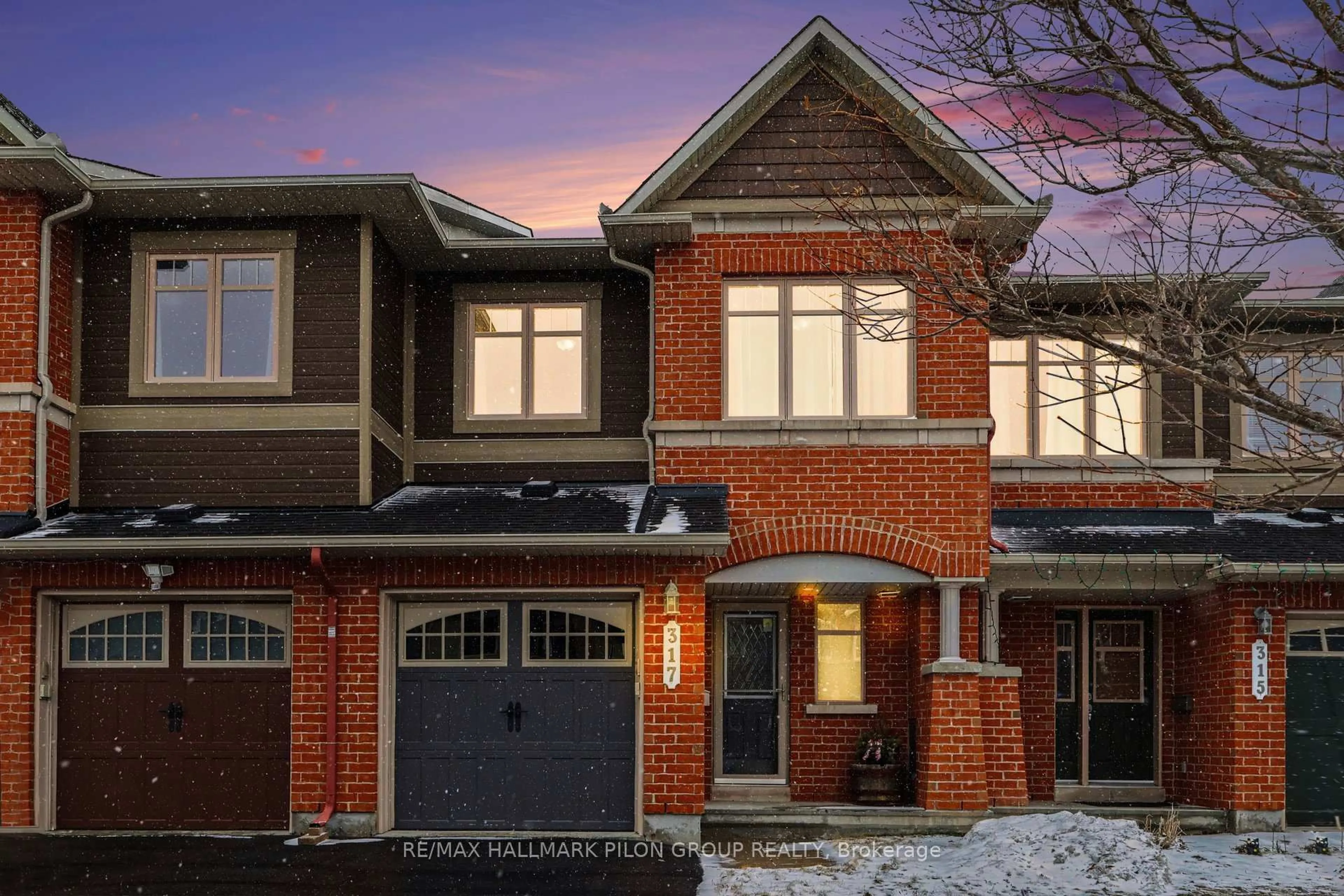 Home with brick exterior material, street for 317 Ravenswood Way, Ottawa Ontario K4A 0R9