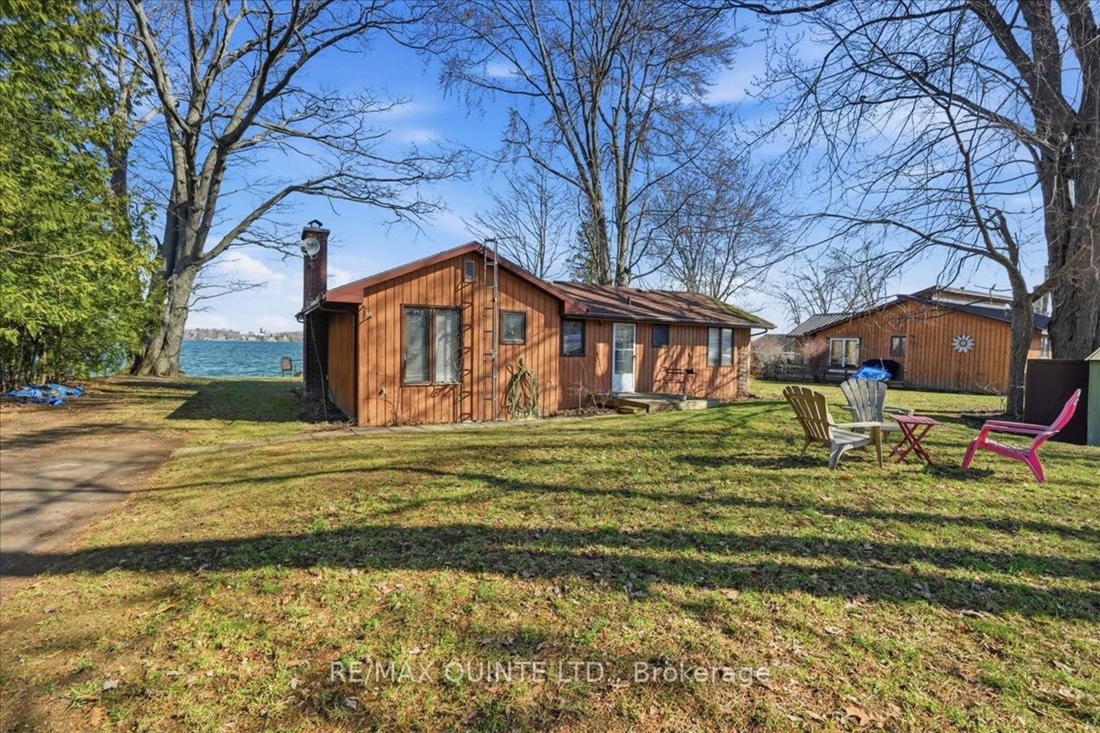 A pic from outside/outdoor area/front of a property/back of a property/a pic from drone, water/lake/river/ocean view for 21D Willoughby Lane, Prince Edward County Ontario K0K 2P0