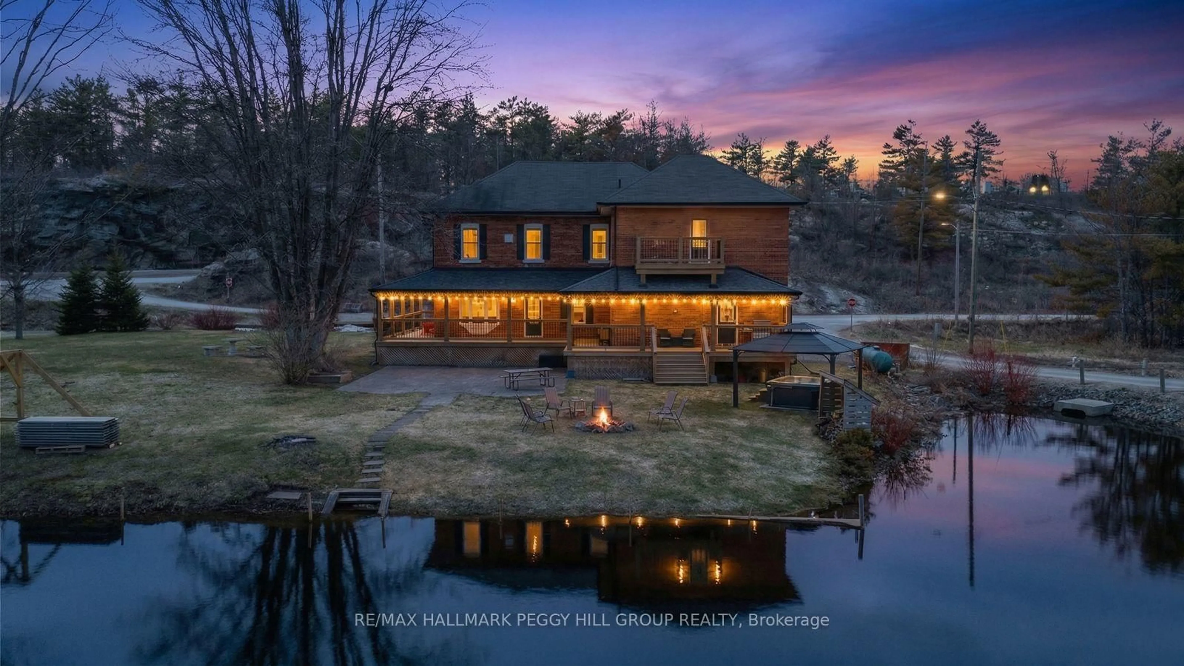 A pic from outside/outdoor area/front of a property/back of a property/a pic from drone, water/lake/river/ocean view for 1002 Cowbell Lane, Gravenhurst Ontario P0E 1N0