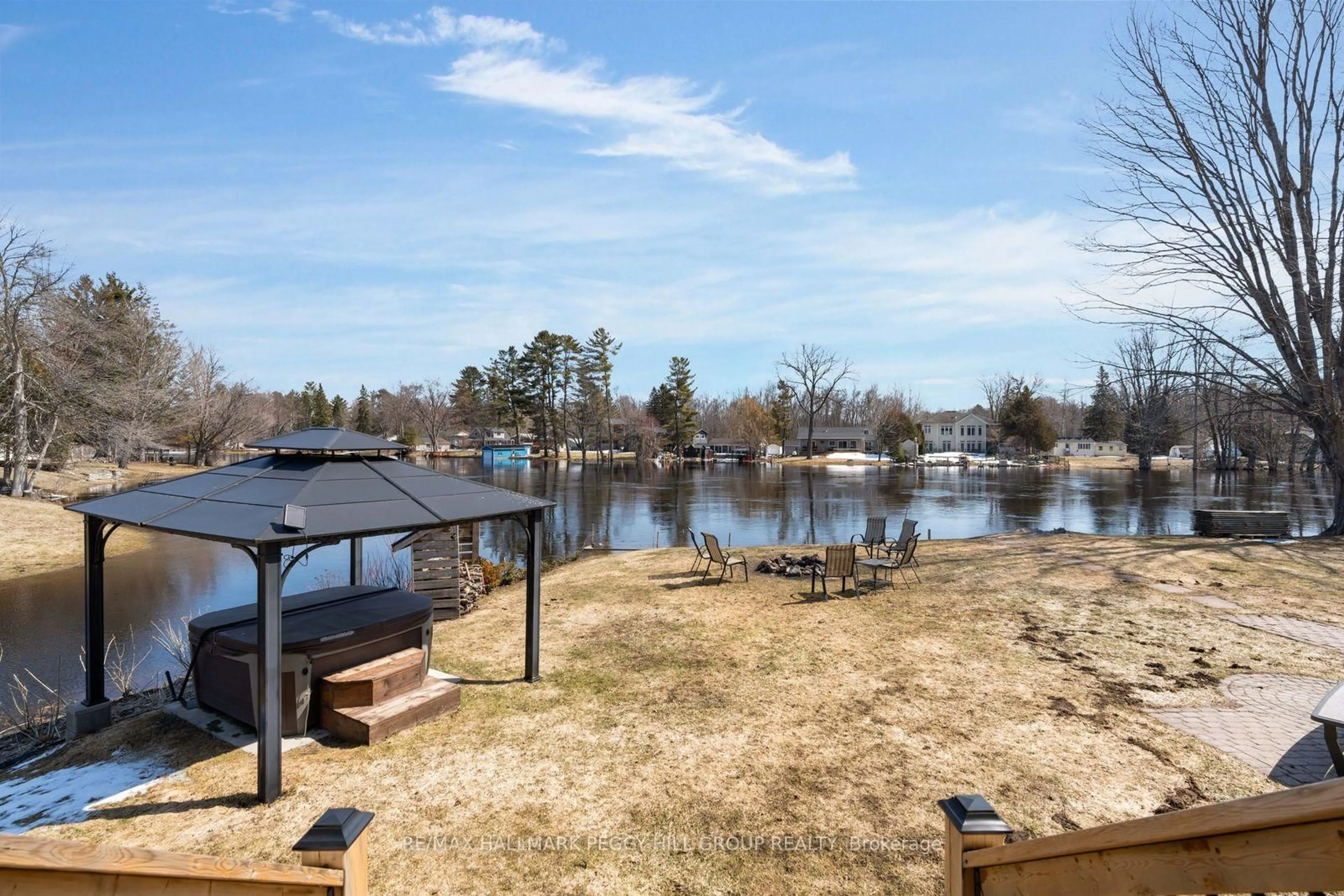 A pic from outside/outdoor area/front of a property/back of a property/a pic from drone, water/lake/river/ocean view for 1002 Cowbell Lane, Gravenhurst Ontario P0E 1N0