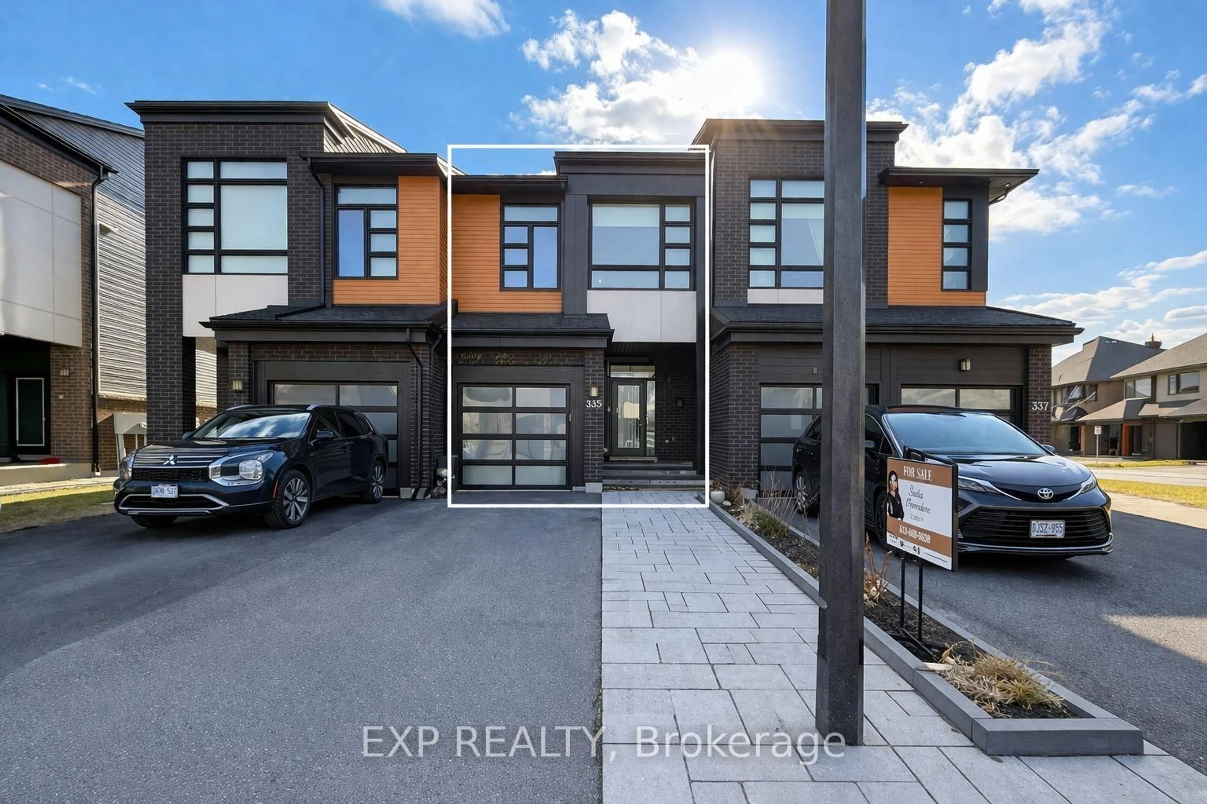 A pic from outside/outdoor area/front of a property/back of a property/a pic from drone, street for 335 Wabasso Lane, Ottawa Ontario K1T 0T2