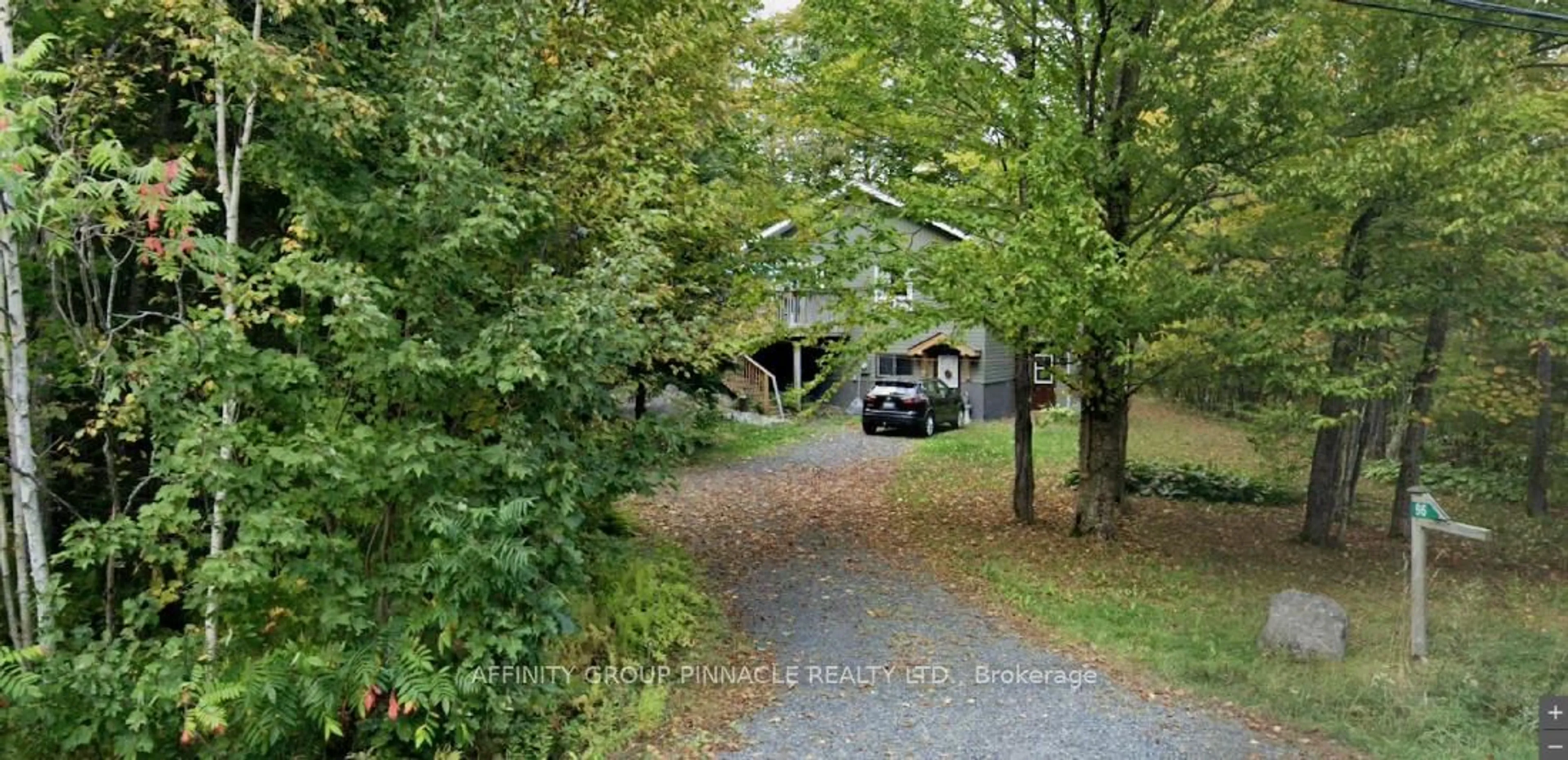 A pic from outside/outdoor area/front of a property/back of a property/a pic from drone, forest/trees view for 96 Pinewood Rd, McDougall Ontario P2A 2W7