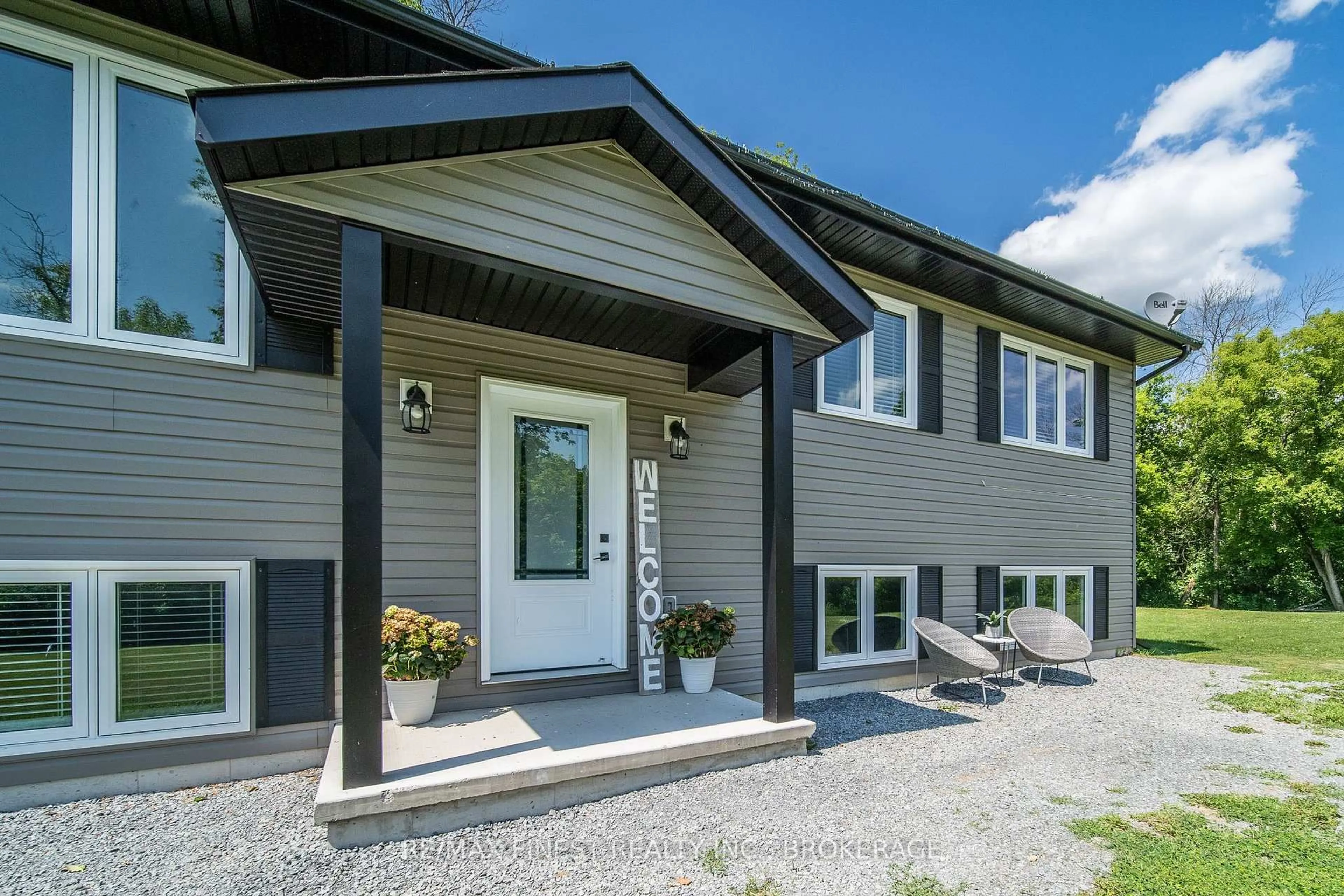 Home with vinyl exterior material, street for 1524 Lake Rd, Kaladar Ontario K0K 1Z0